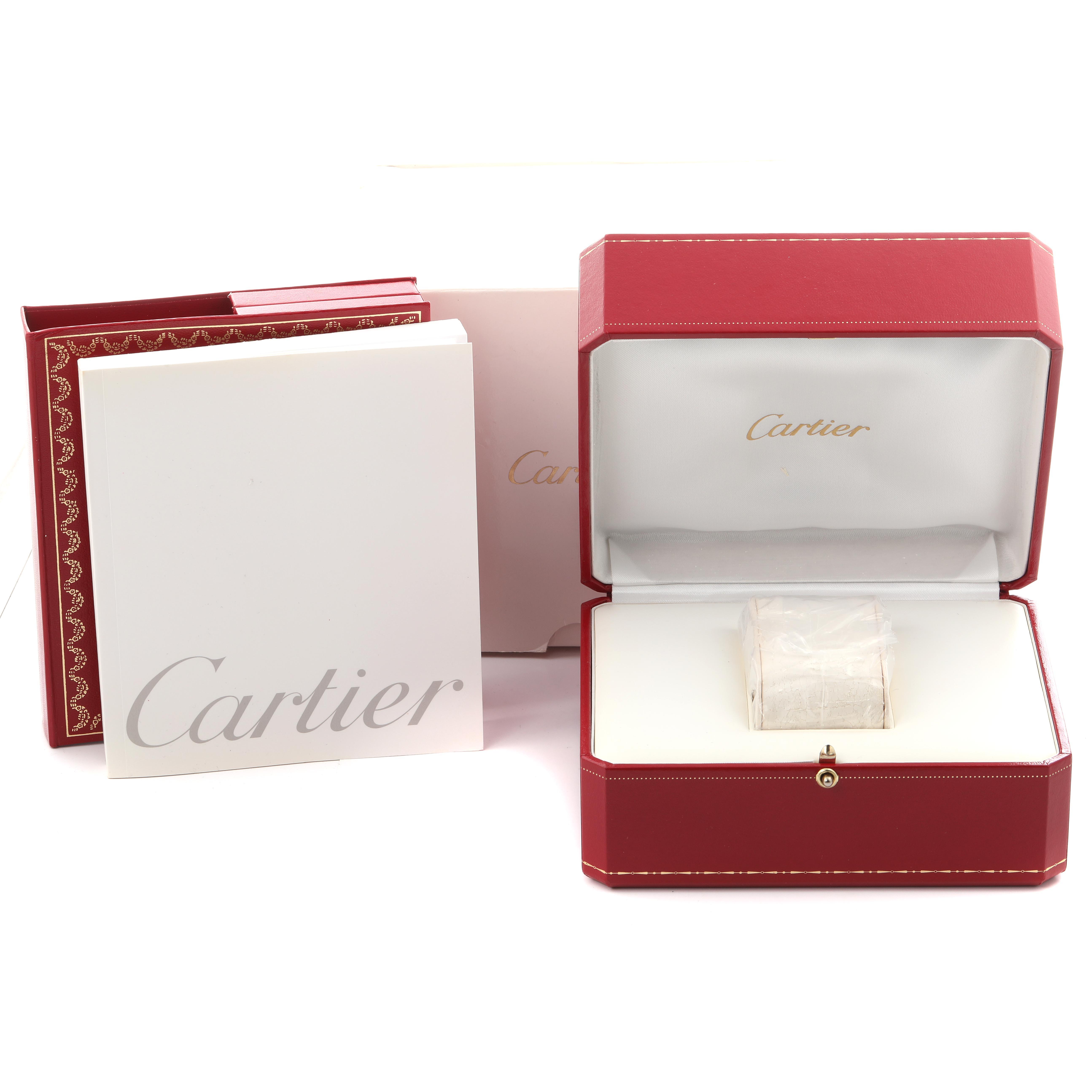 The image shows a Cartier Roadster W62042Y5 Men's Rose Gold Black Dial W62042Y5 Men's Rose Gold Black Dial watch box and packaging, including the red presentation box and branded documentation.