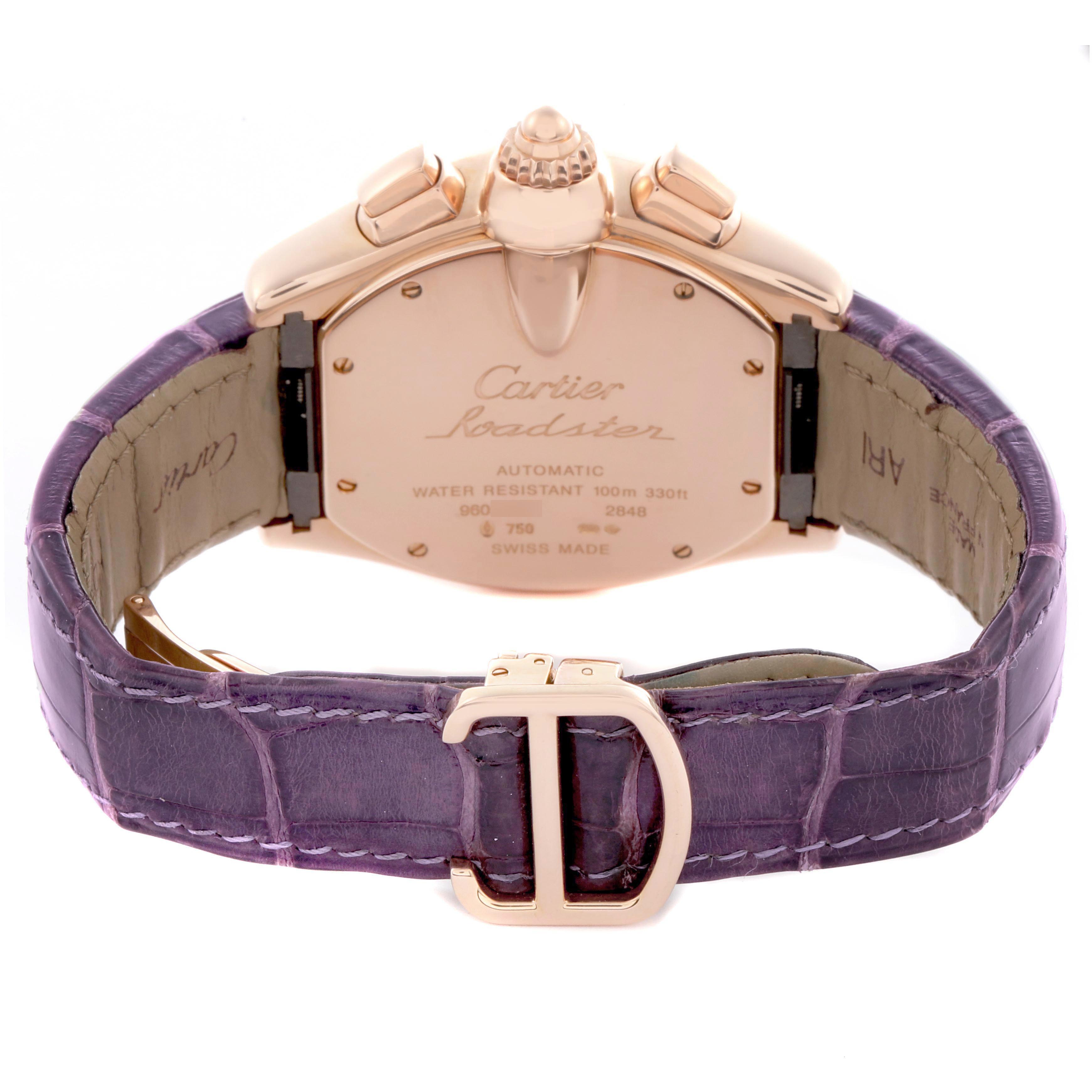 The image shows the back of a Cartier Roadster W62042Y5 Men's Rose Gold Brown Dial watch, highlighting the case back, crown, and purple leather strap.