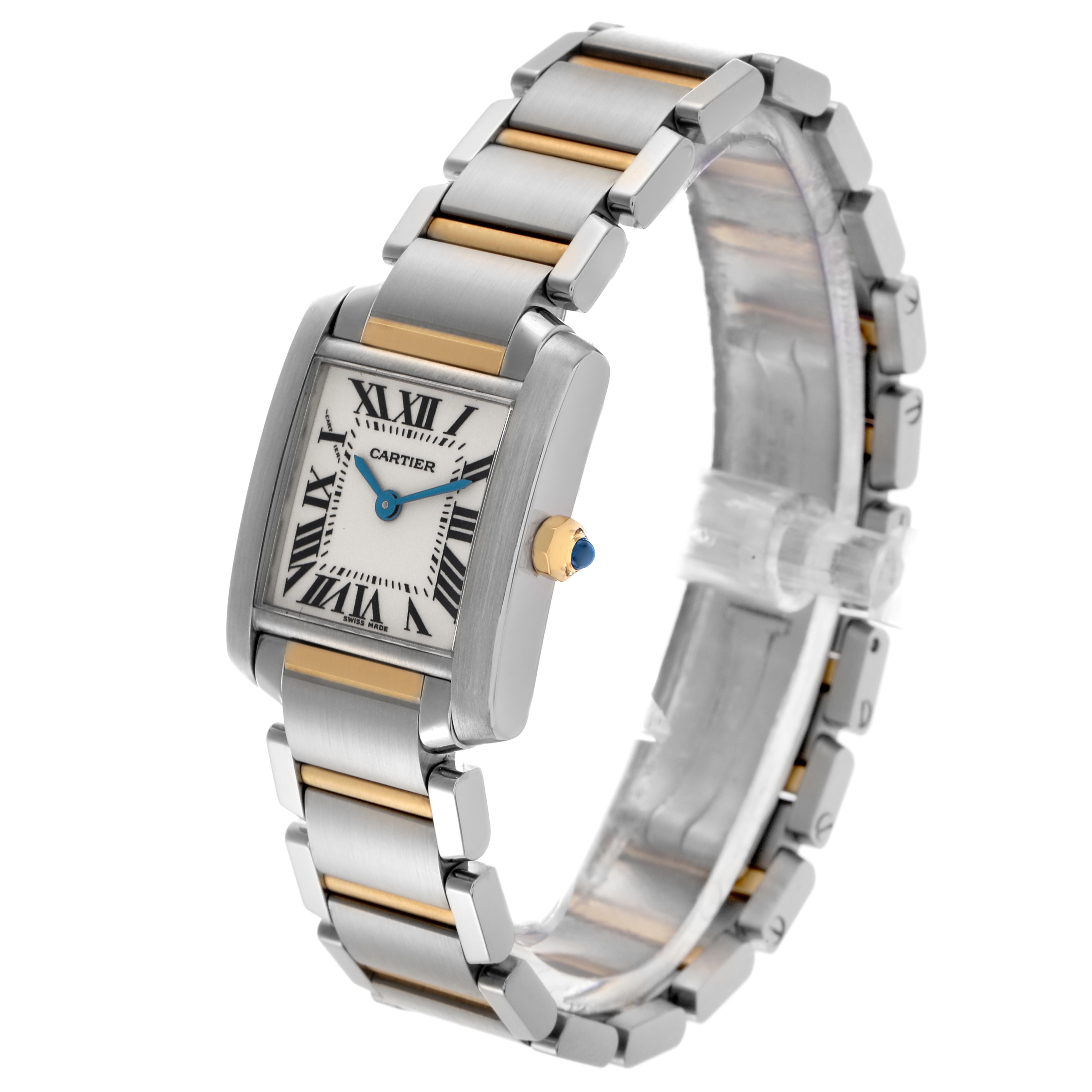 The Cartier Tank Française watch is shown at an angle highlighting the face, case, and two-tone bracelet.