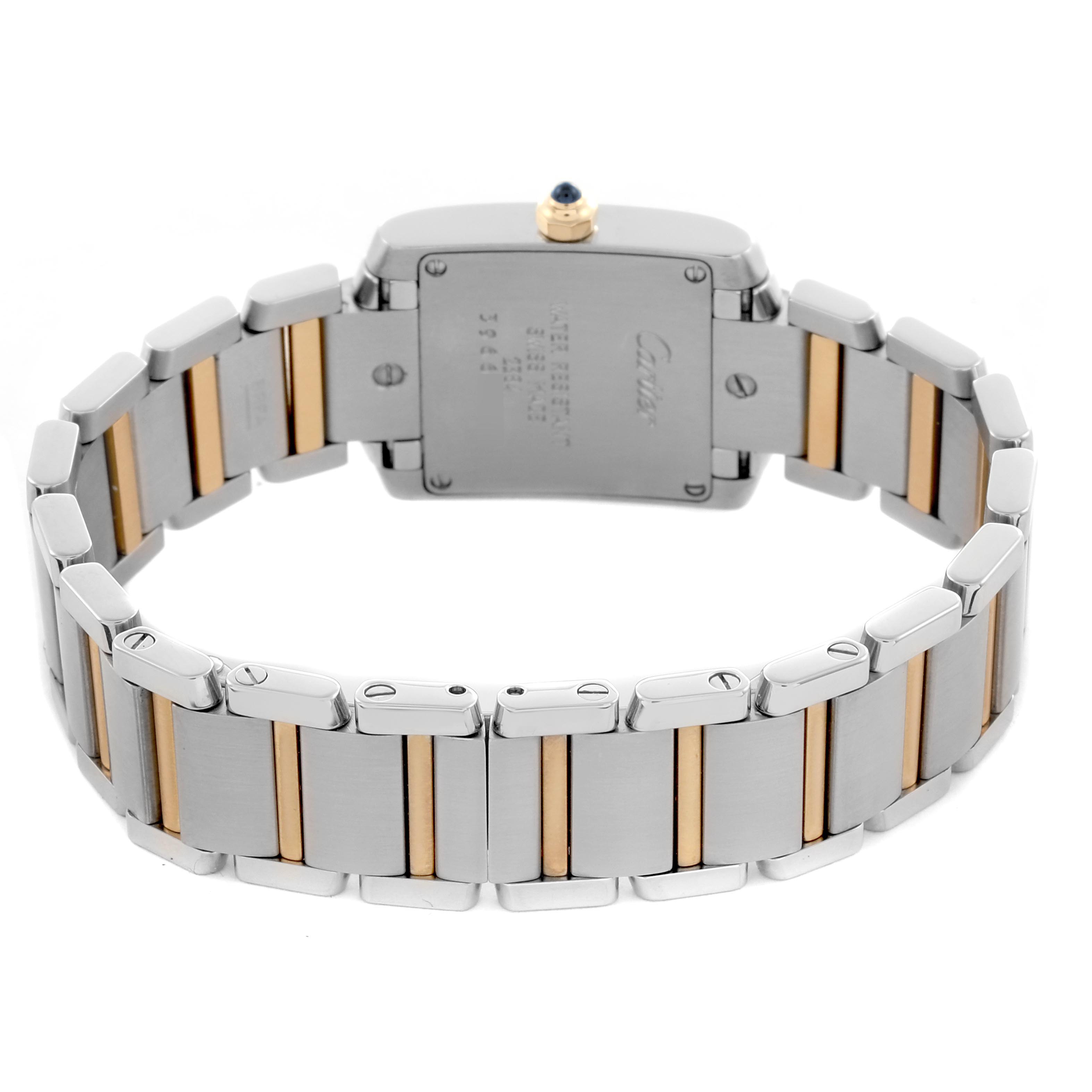 The Cartier Tank Française is shown from the back, highlighting the bracelet links and case back.