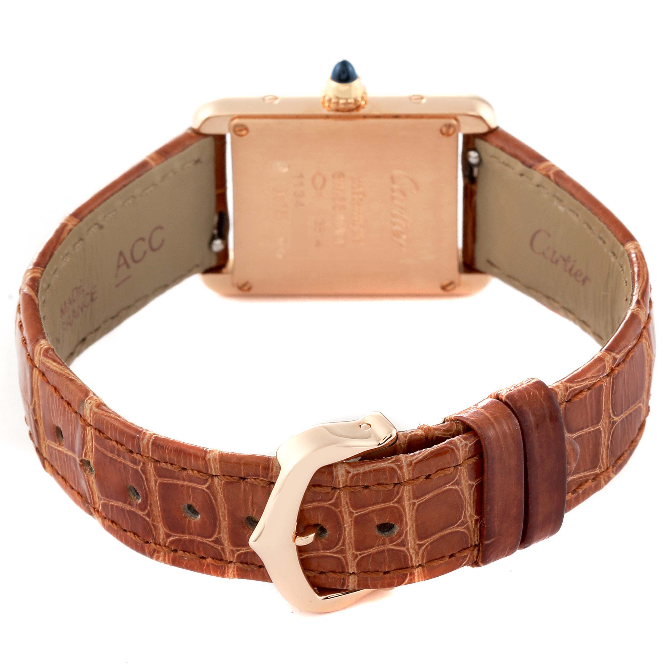 The image shows the back side of a Cartier Tank Louis WGTA0010 Women
s Rose Gold Silver Dial WGTA0010 Women
s Rose Gold Silver Dial watch, including its leather strap and buckle.