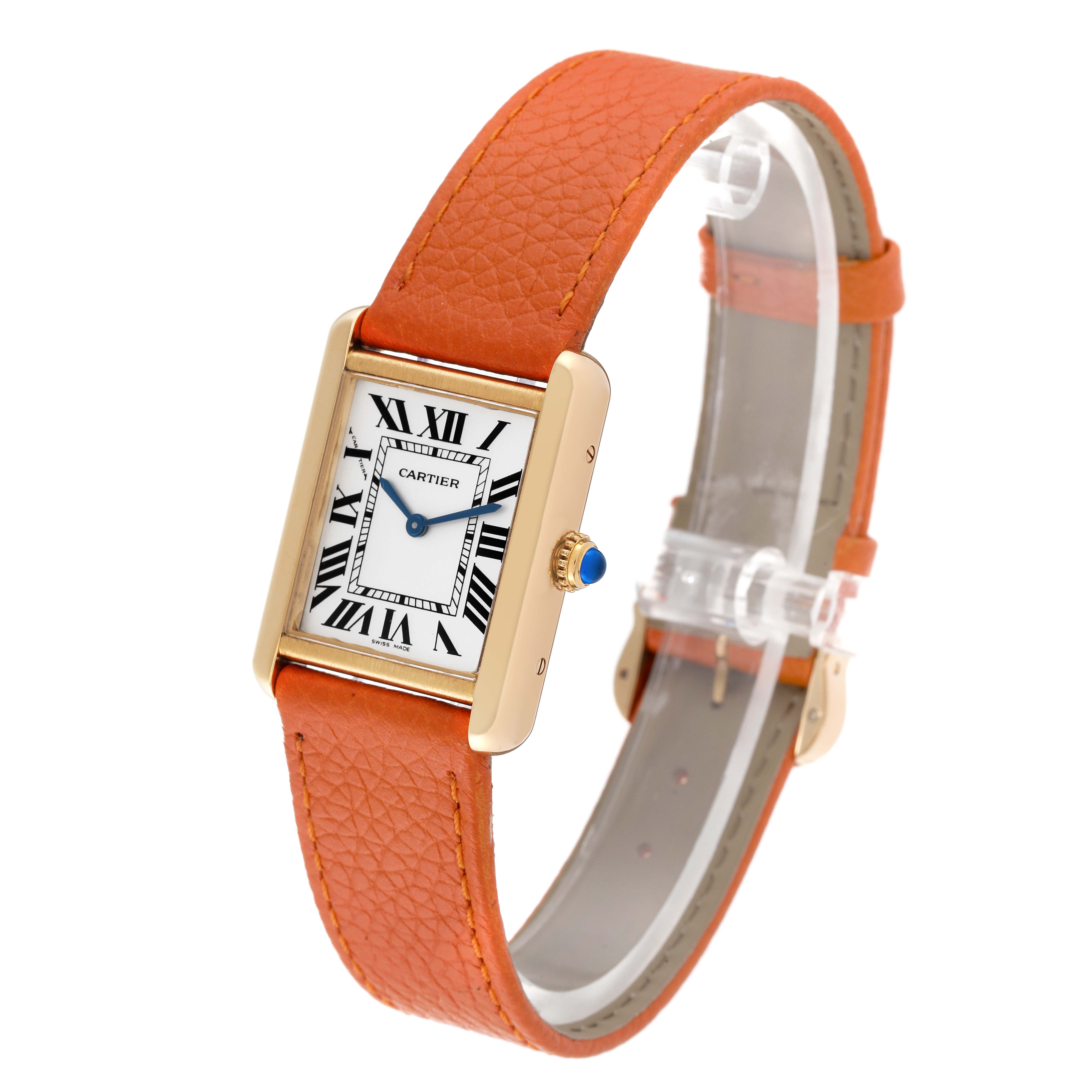 The image shows a side and front angle of a Cartier Tank Solo W5200002 Women
s Steel and Gold (two tone) Silver Dial W5200002 Women
s Steel and Gold (two tone) Silver Dial watch with an orange leather strap.