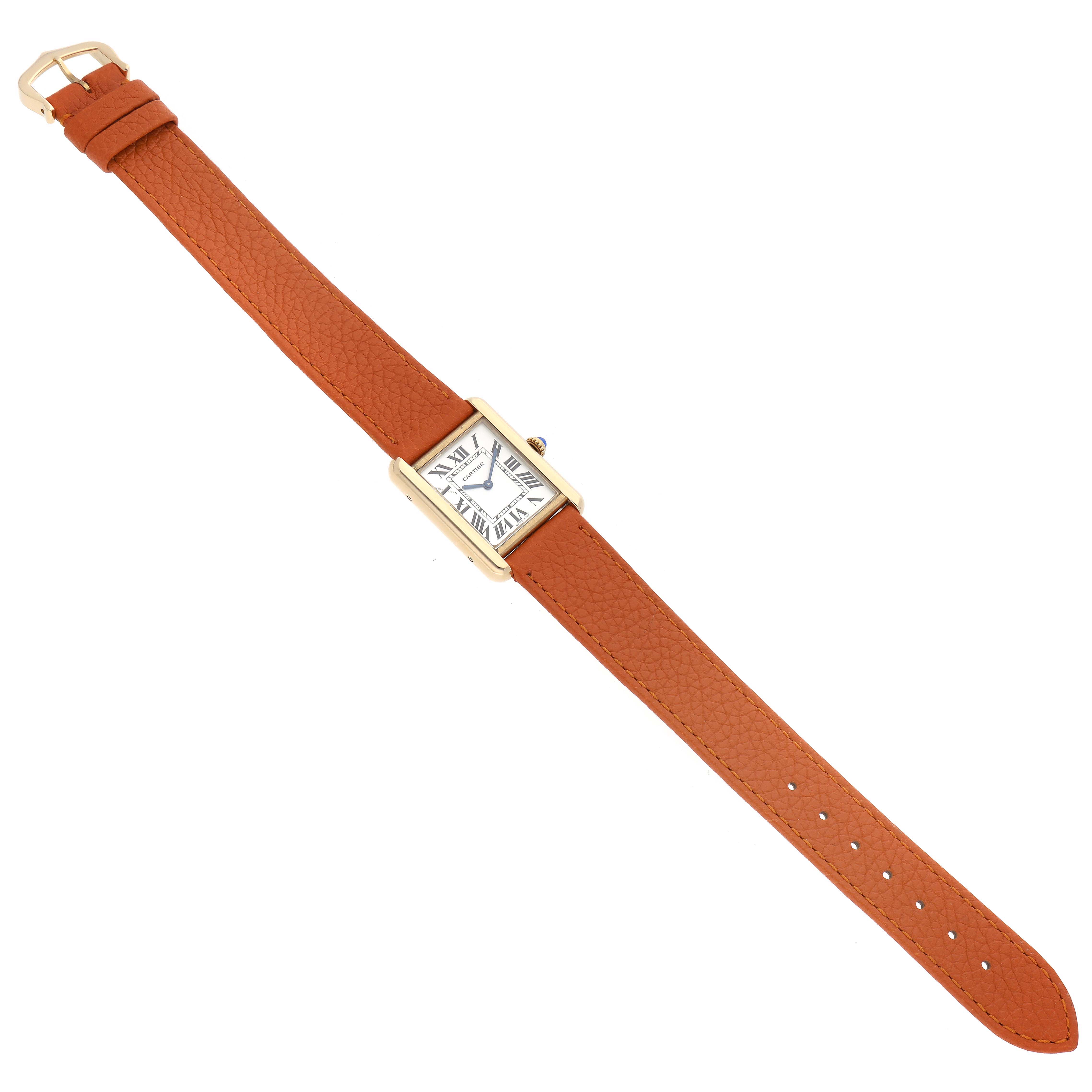 The Cartier Tank Solo W5200002 Women
s Steel and Gold (two tone) Silver Dial W5200002 Women
s Steel and Gold (two tone) Silver Dial watch is shown from an overhead angle, displaying its leather strap and rectangular face.