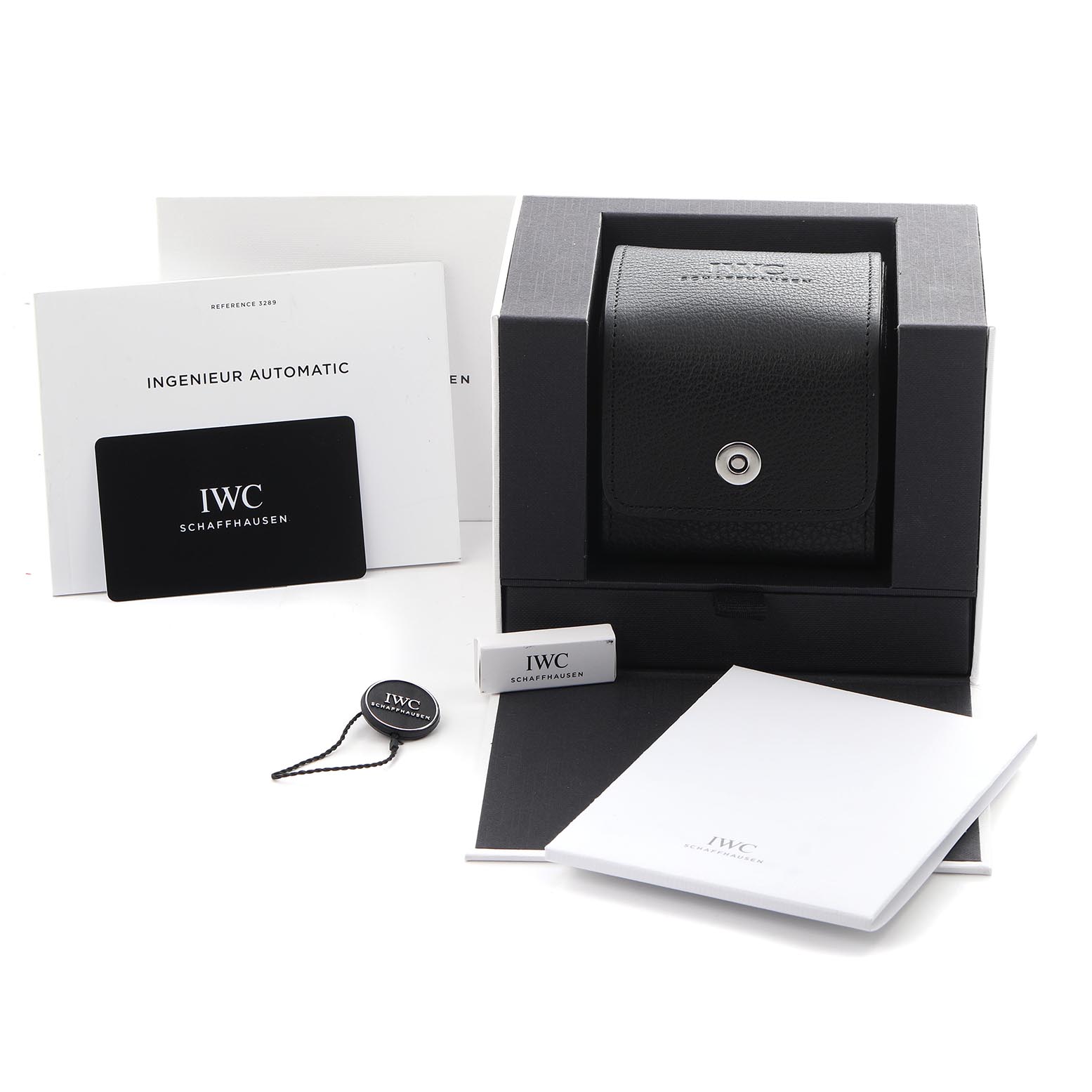 The image displays the IWC Ingenieur IW328904 Men's Titanium Grey Dial IW328904 Men's Titanium Grey Dial watch packaging, including the box, manuals, tag, and warranty card, at a frontal angle.
