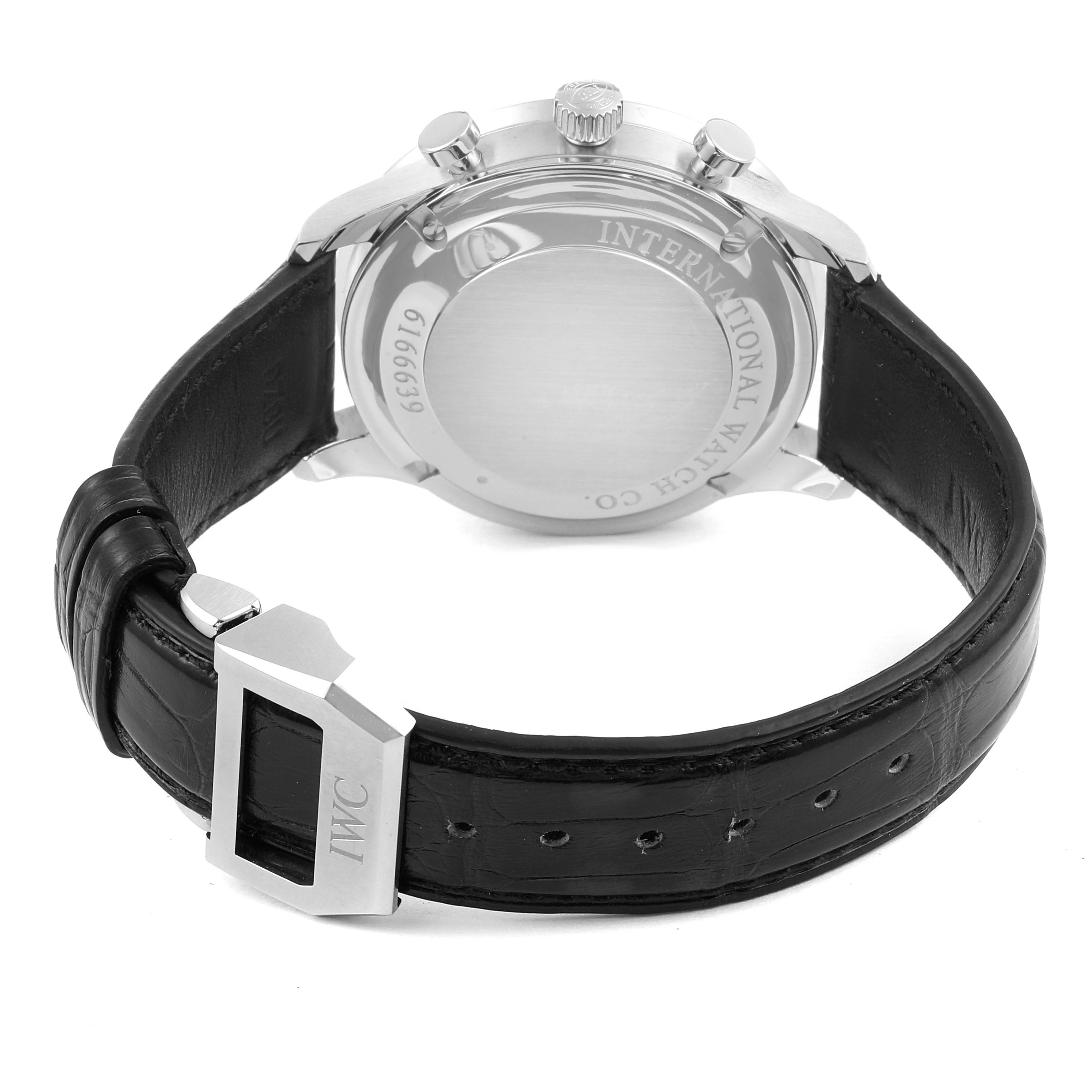 The image shows the back view of an IWC Portuguese IW371491 Men's Stainless Steel Blue Dial IW371491 Men's Stainless Steel Blue Dial model watch, featuring the case back, crown, and leather strap with a buckle.