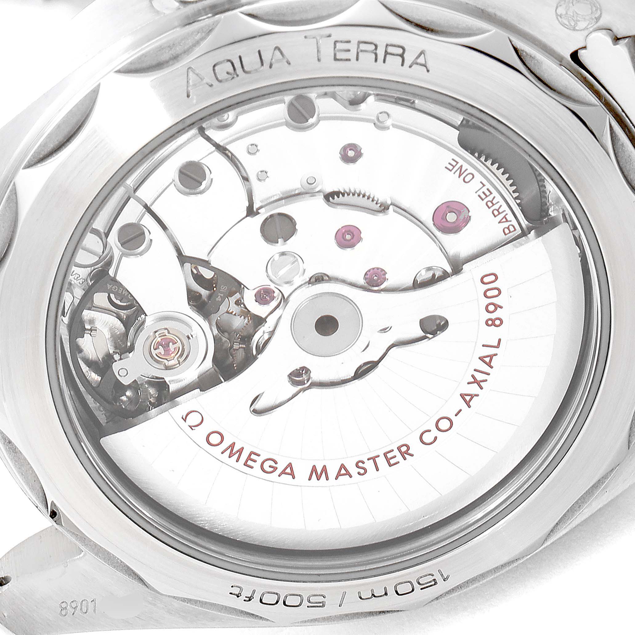 The image shows the back of the Omega Aqua Terra 220.10.41.21.01.001 Men's Stainless Steel Black Dial 220.10.41.21.01.001 Men's Stainless Steel Black Dial watch, highlighting its internal mechanism and engraved details.