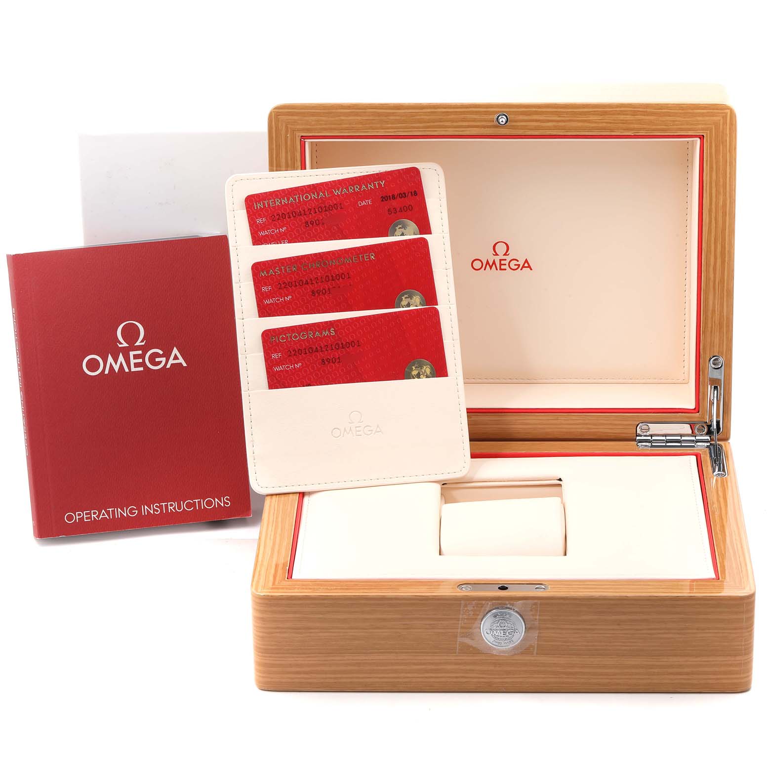 The image shows an Omega Aqua Terra 220.10.41.21.01.001 Men's Stainless Steel Black Dial 220.10.41.21.01.001 Men's Stainless Steel Black Dial watch box and accessories, including operating instructions and warranty cards, displayed from above.