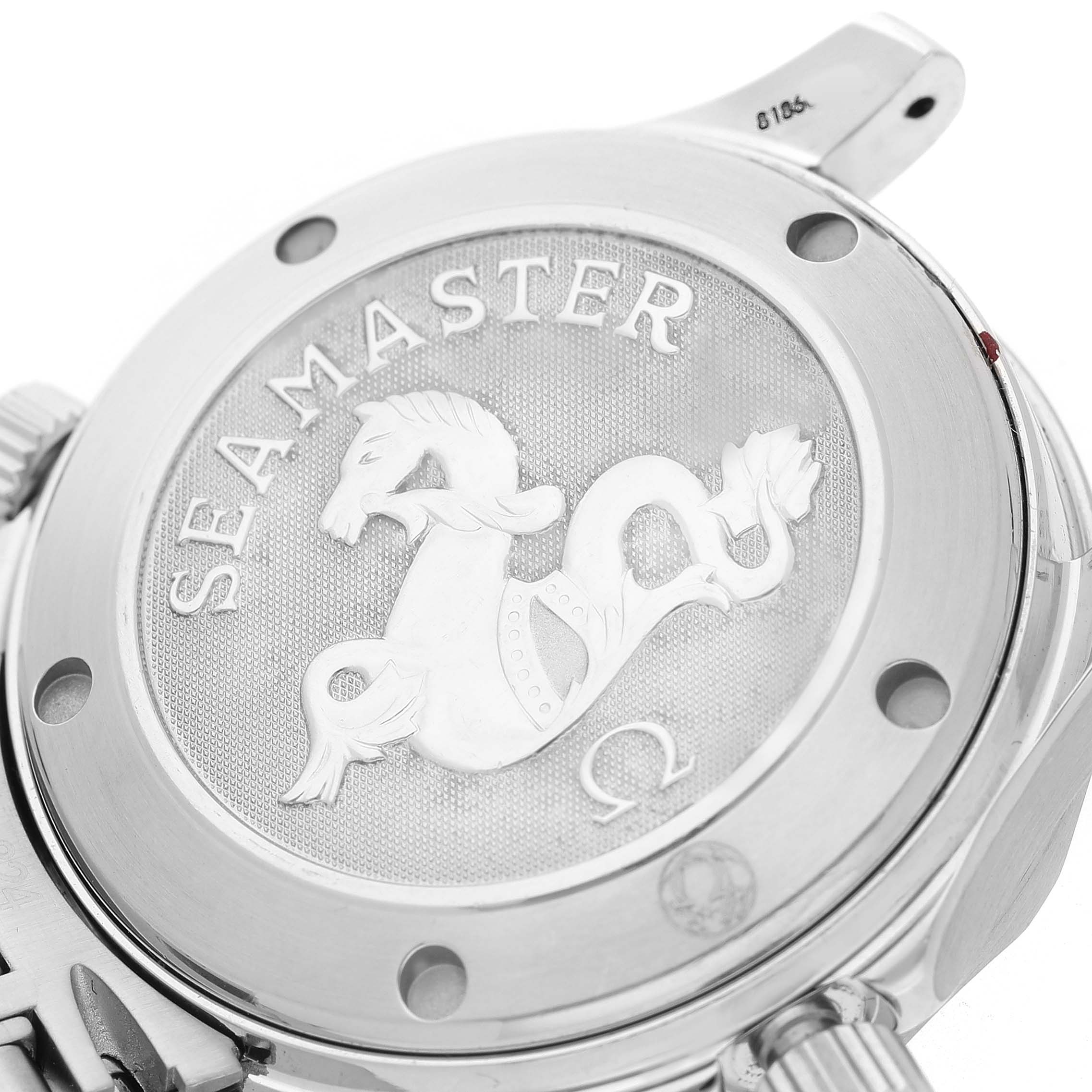 The image shows the case back of an Omega Seamaster 212.30.36.20.01.001 Men's Stainless Steel Black Dial watch featuring the engraved logo.