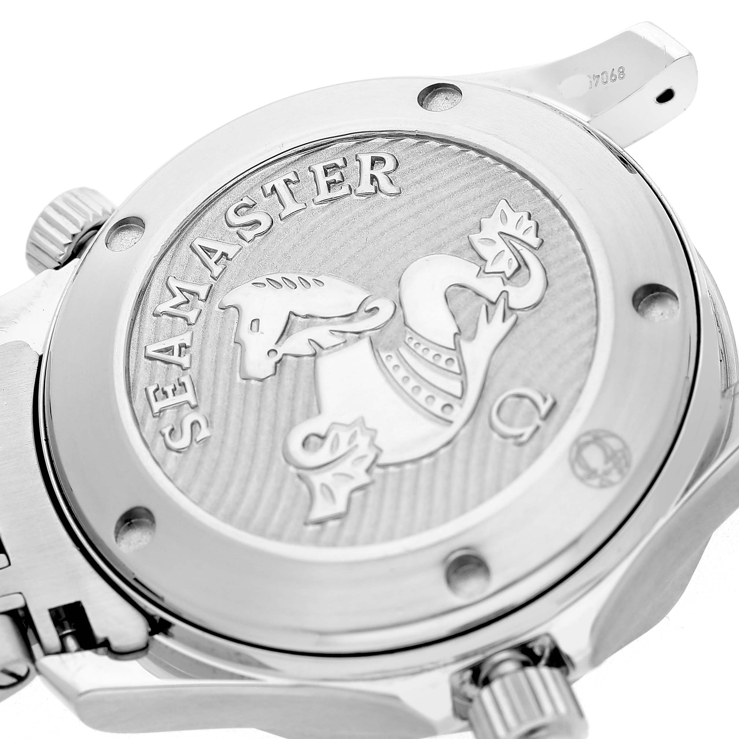 The image shows the back case of an Omega Seamaster 212.30.36.20.01.002 Men's Stainless Steel Black Dial watch, featuring an engraved design with the brand logo and a wavy pattern.