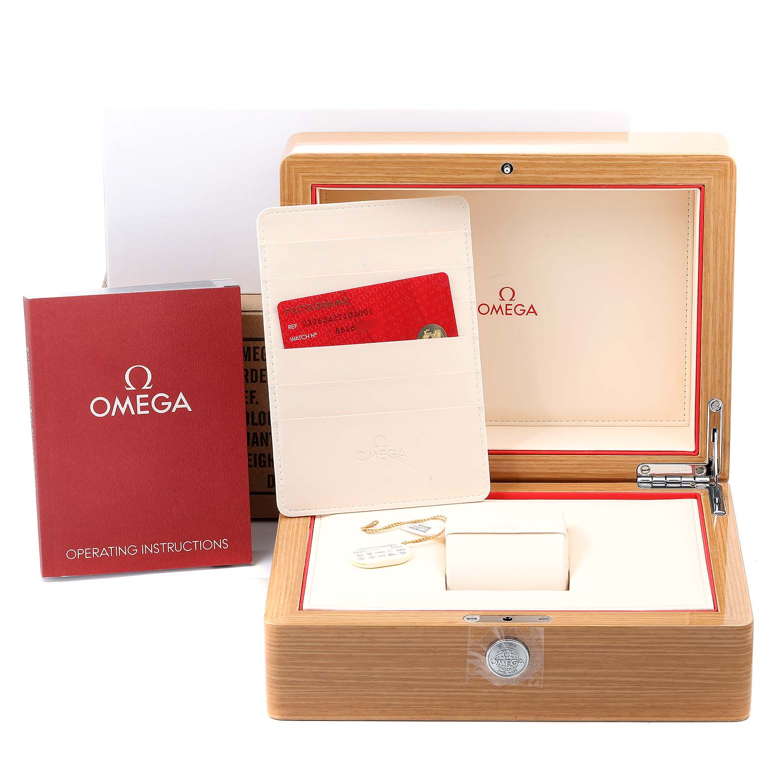 The image shows an open Omega Planet Ocean 232.63.42.21.01.001 Men's Rose Gold Black Dial 232.63.42.21.01.001 Men's Rose Gold Black Dial watch box, a manual, and a cardholder with certification cards.