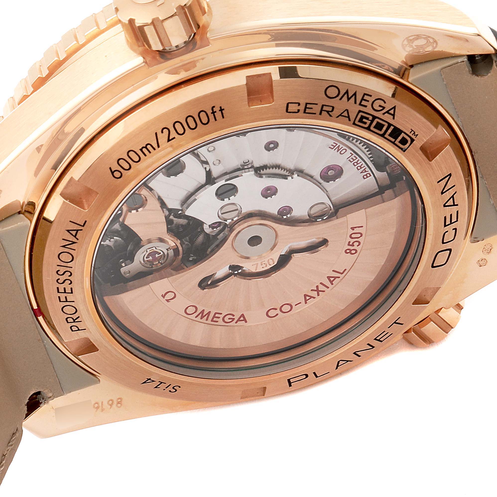 The image shows the back view of the Omega Planet Ocean 232.15.46.21.04.001 Men's Rose Gold Black Dial 232.15.46.21.04.001 Men's Rose Gold Black Dial watch, highlighting its movement and case details.