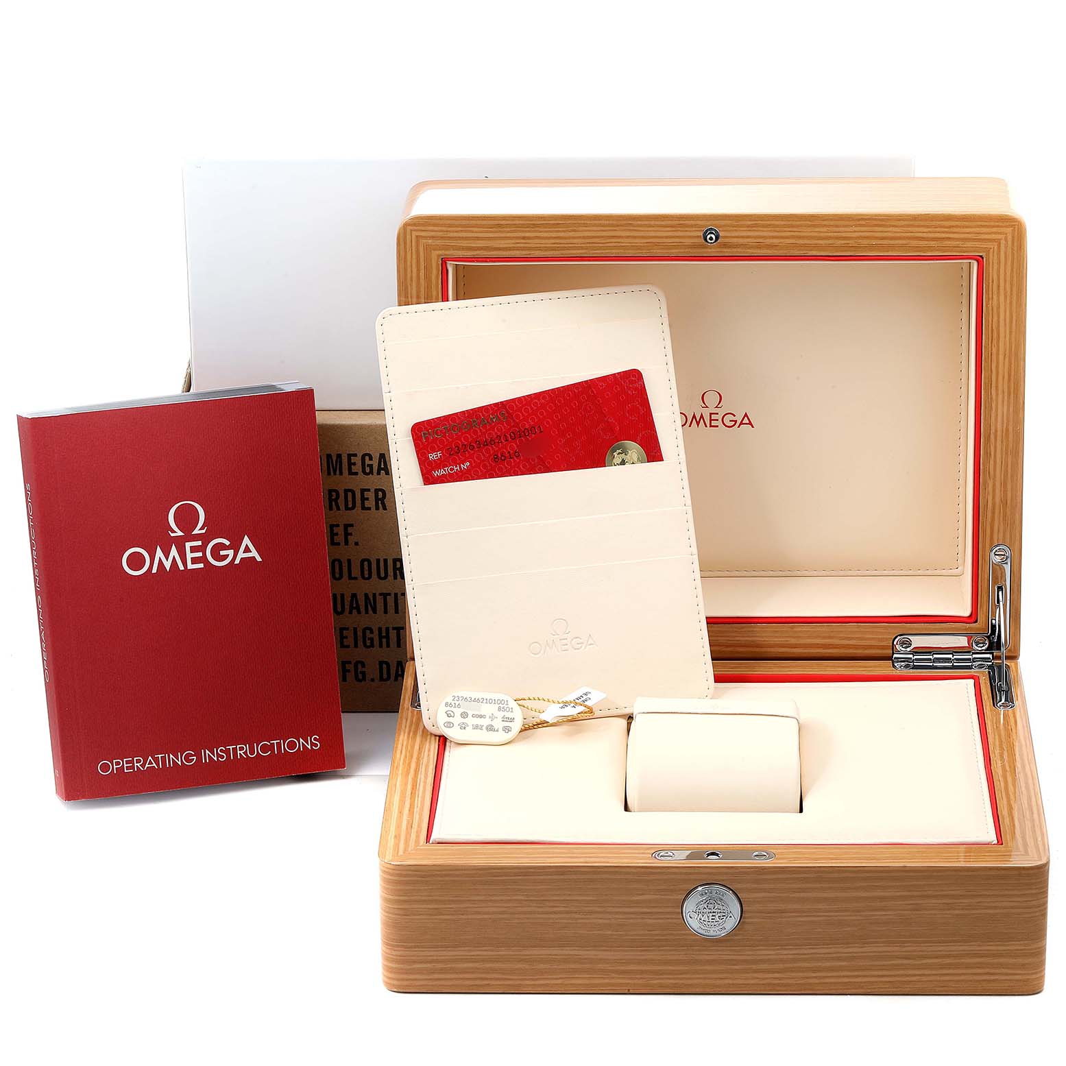 The image shows the full watch box and accessories for the Omega Planet Ocean 232.15.46.21.04.001 Men's Rose Gold Black Dial 232.15.46.21.04.001 Men's Rose Gold Black Dial model, including the box, cards, and operating instructions.