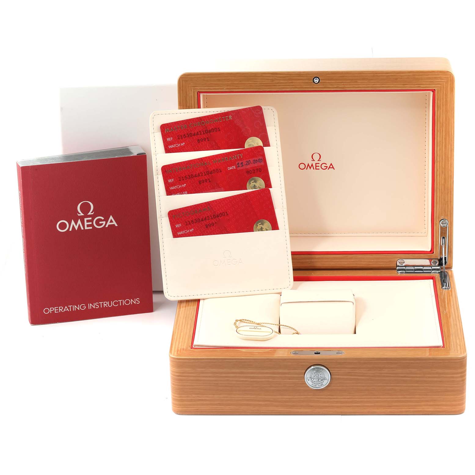 The image shows an Omega Planet Ocean 215.30.44.21.04.001 Men's Stainless Steel White Dial 215.30.44.21.04.001 Men's Stainless Steel White Dial watch box, operating instructions, and warranty cards.