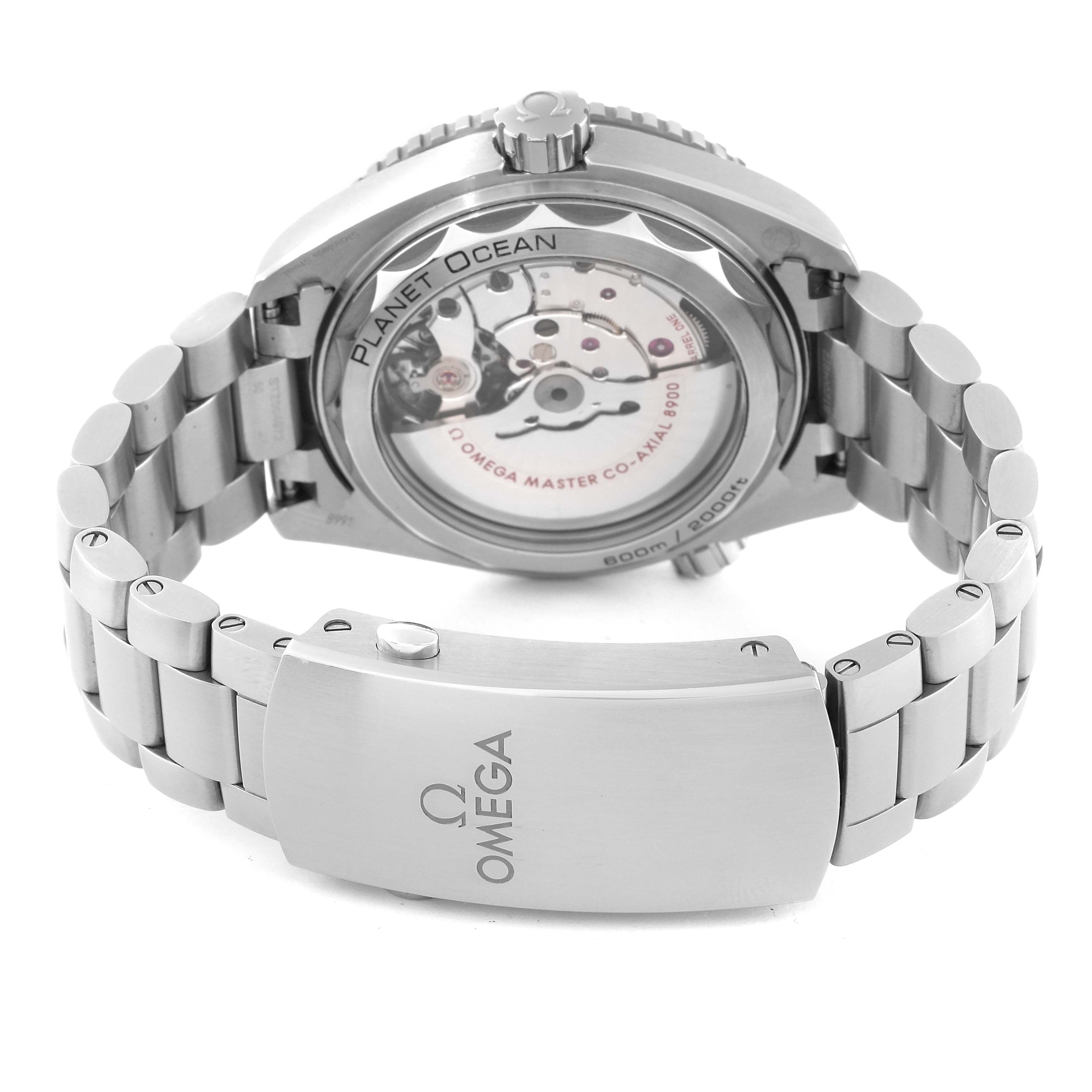 The image shows the back view of an Omega Planet Ocean 215.30.44.21.04.001 Men's Stainless Steel White Dial 215.30.44.21.04.001 Men's Stainless Steel White Dial watch, highlighting its case back and stainless steel bracelet.