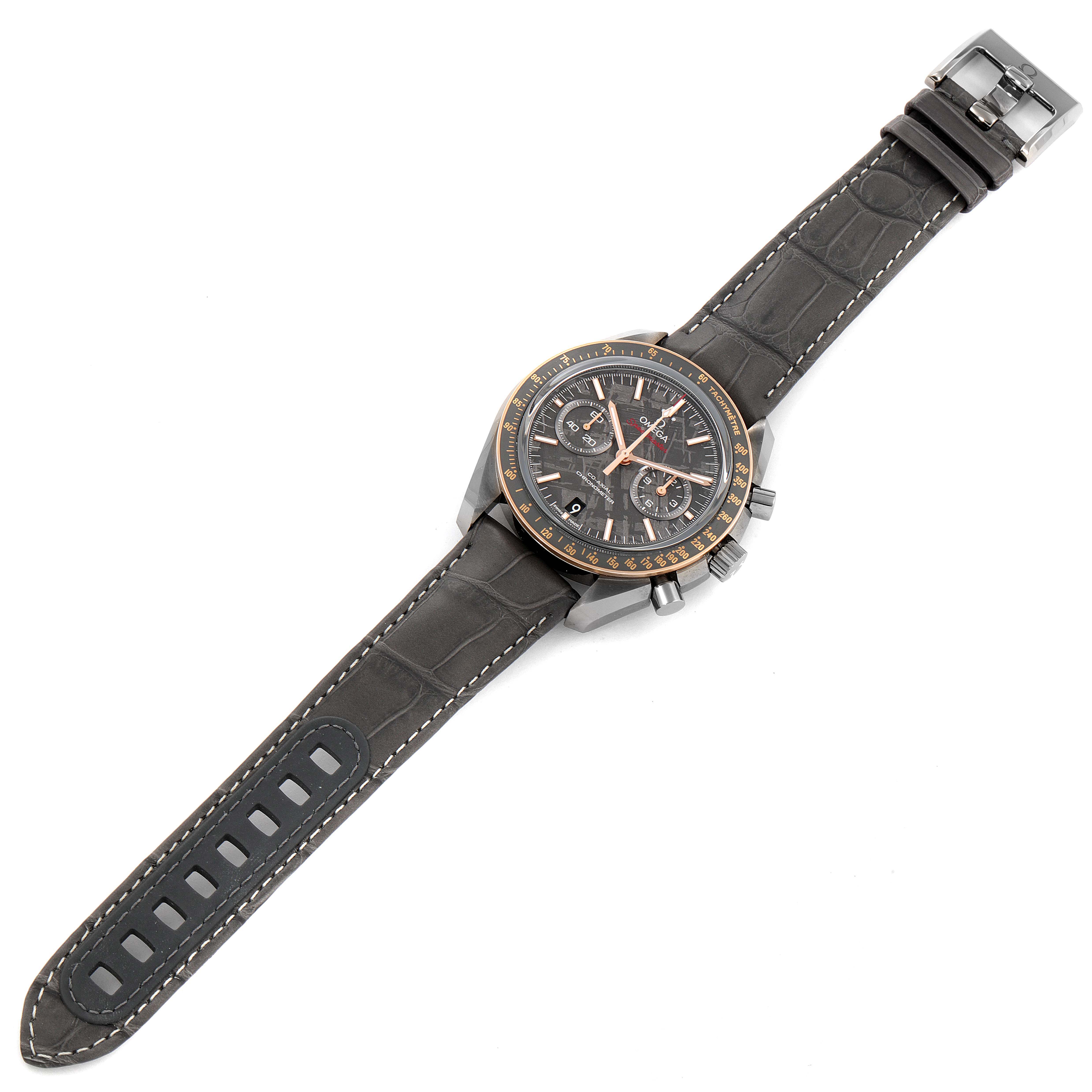 The image shows an Omega Speedmaster 311.63.44.51.99.002 Men
s Ceramic Grey Dial 311.63.44.51.99.002 Men
s Ceramic Grey Dial watch from an overhead angle, displaying the entire dial, strap, and clasp.