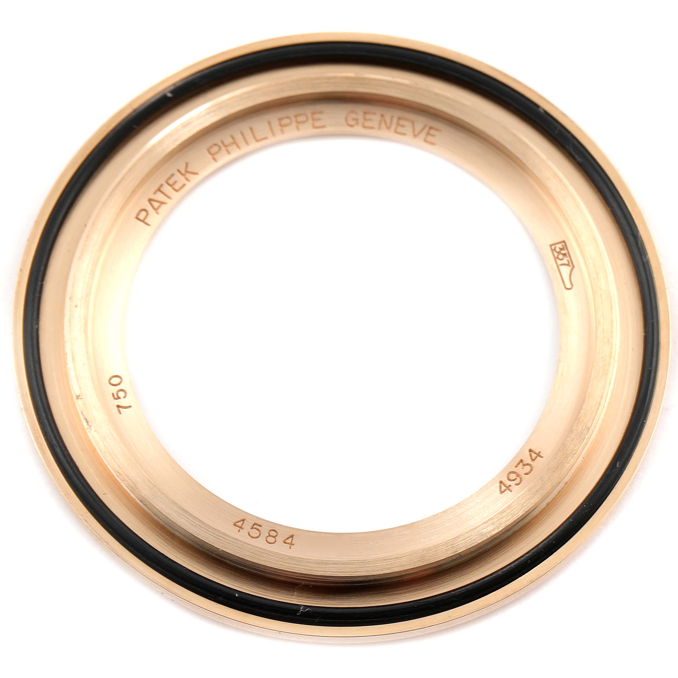 This image shows a close-up of the bezel for a Patek Philippe Calatrava 4934R Women's Rose Gold Mother of Pearl Dial 4934R Women's Rose Gold Mother of Pearl Dial watch.