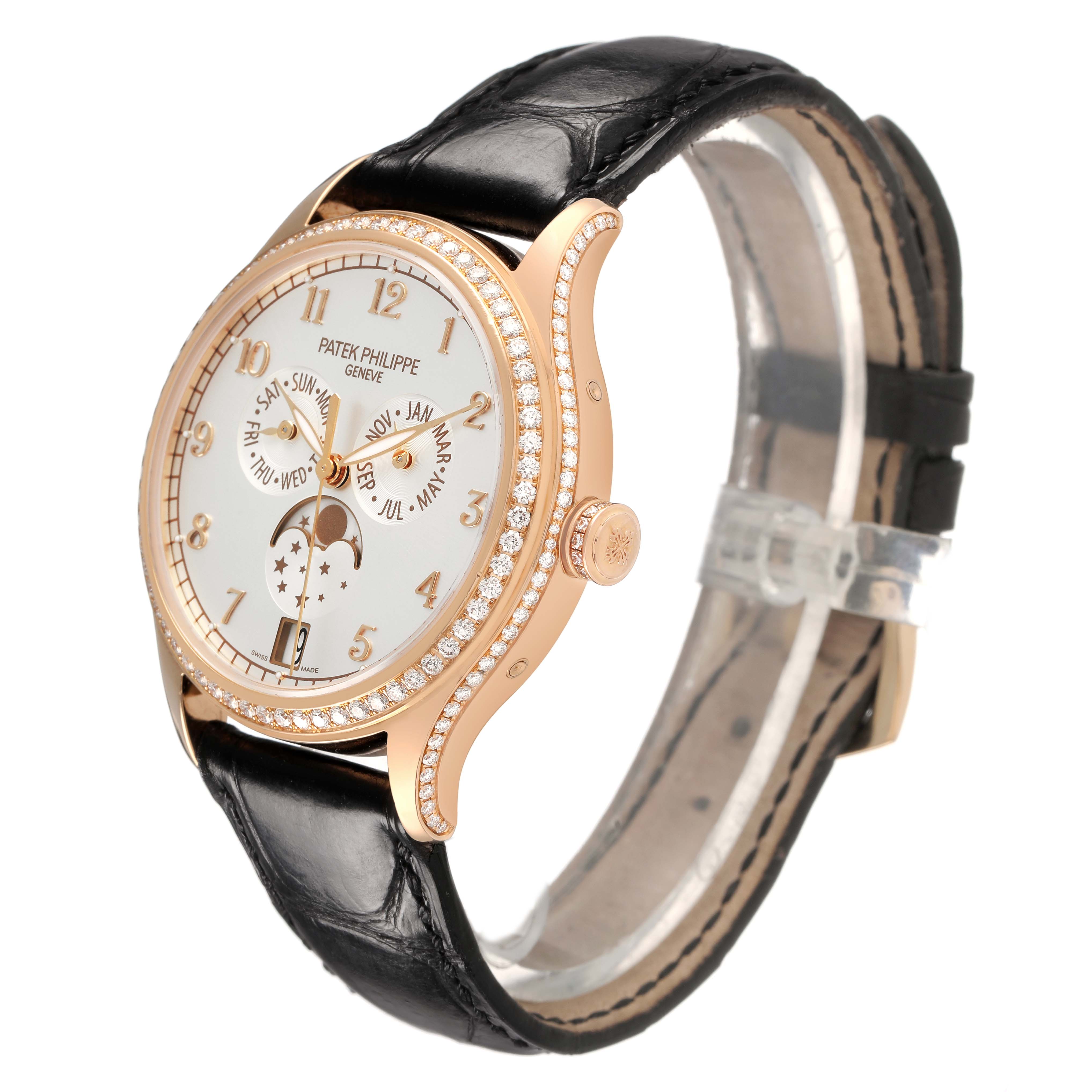 The Patek Philippe Complications 4947R-001 Men's Rose Gold Silver Dial watch is shown at a three-quarter angle, highlighting the face, bezel, and leather strap.