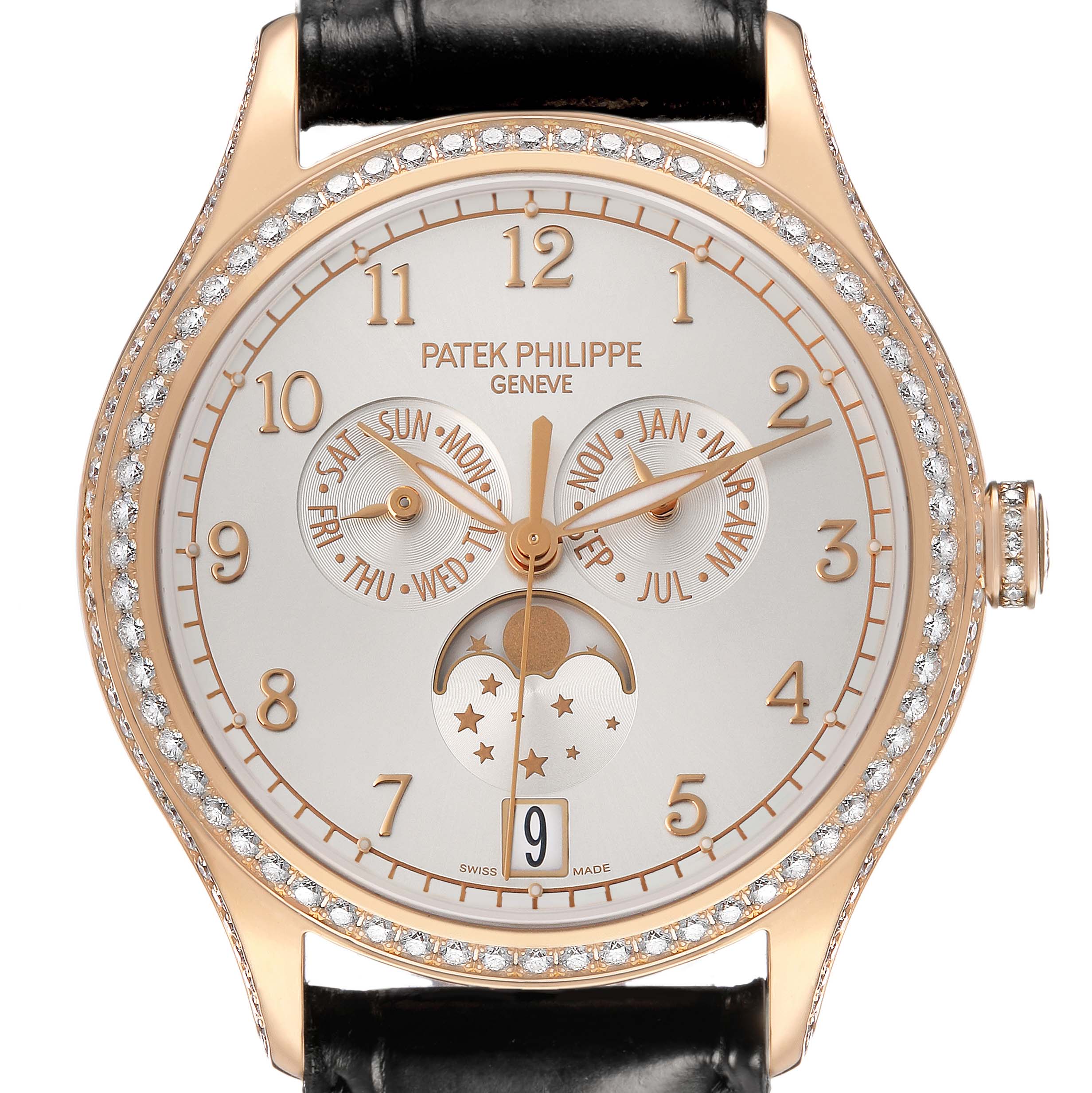 The Patek Philippe Complications 4947R-001 Men's Rose Gold Silver Dial watch is shown from the front, highlighting its dial, complications, and diamond-studded bezel.