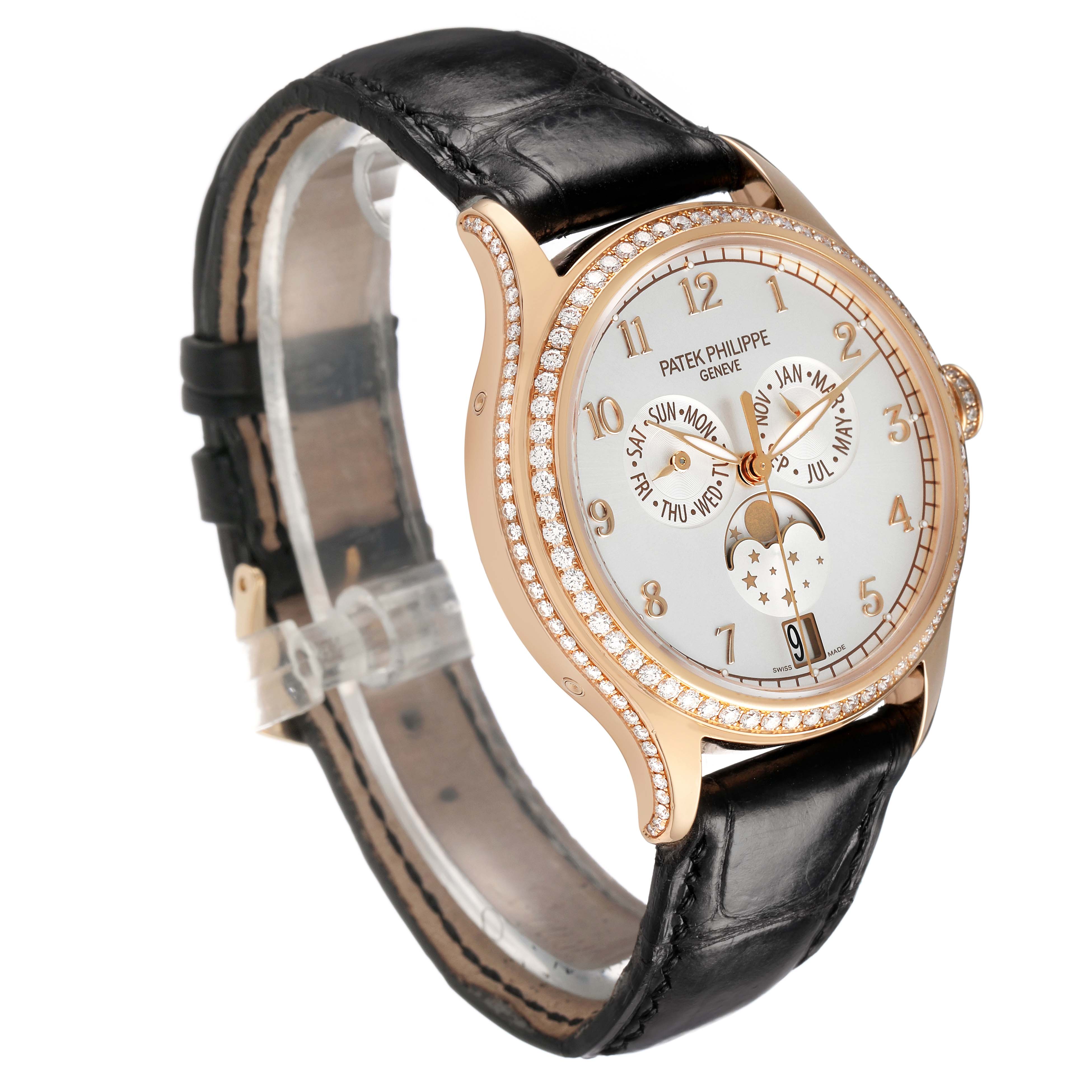 The Patek Philippe Complications 4947R-001 Men's Rose Gold Silver Dial watch is shown from a front angle, highlighting the dial, bezel, and black leather strap.