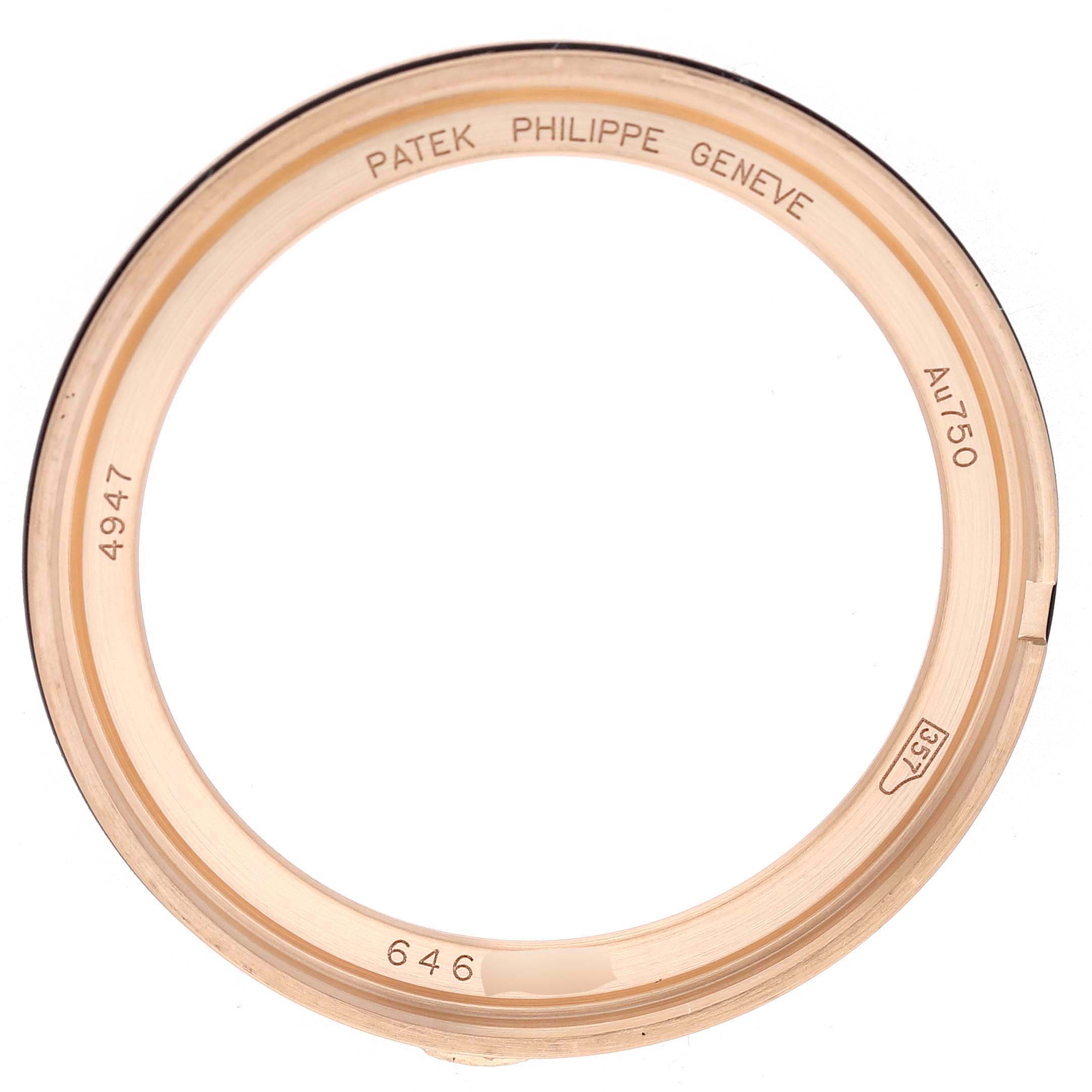 This image shows a top-down view of the bezel from the Patek Philippe Complications 4947R-001 Men's Rose Gold Silver Dial model, with engravings visible.