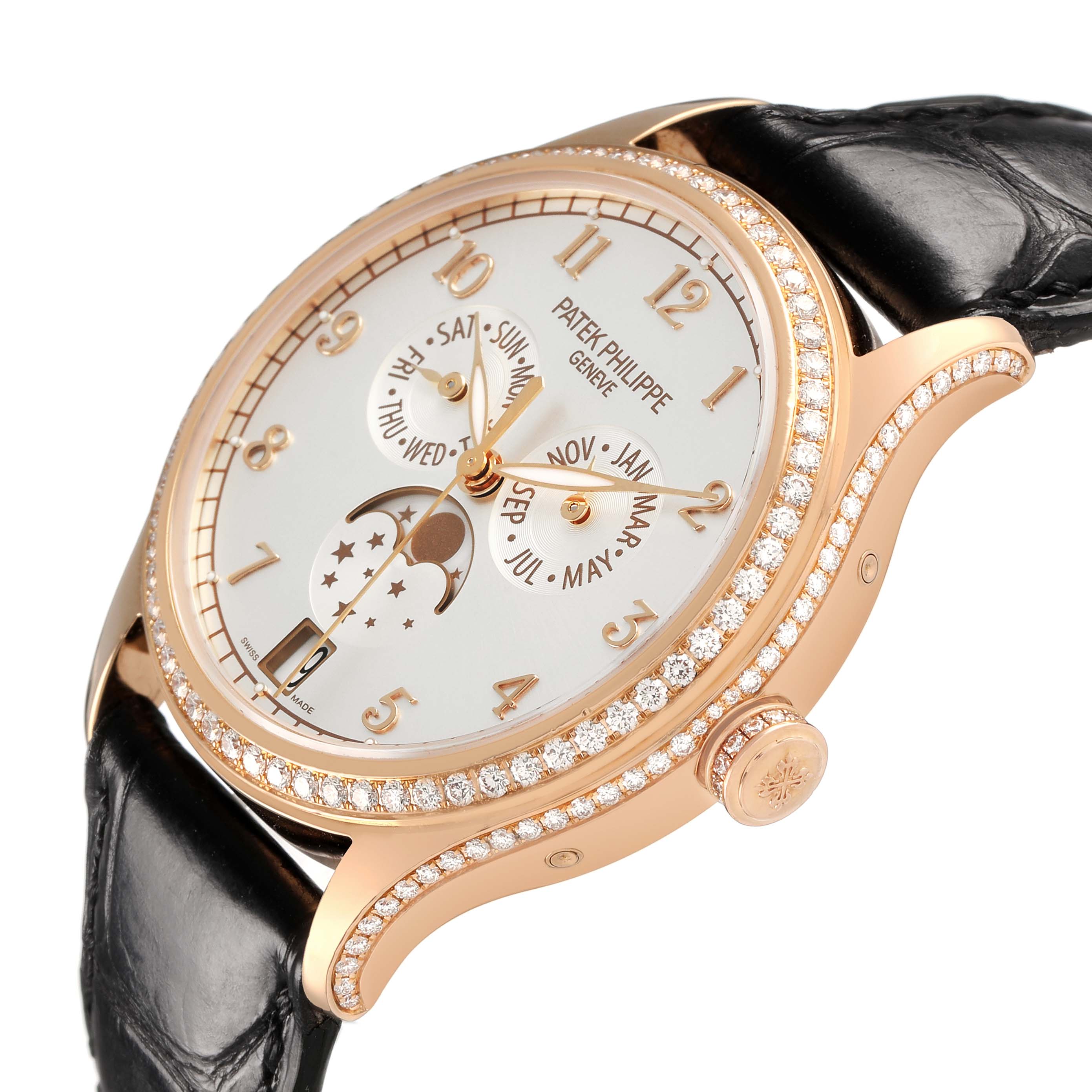 The Patek Philippe Complications 4947R-001 Men's Rose Gold Silver Dial watch is shown at an angled side view, highlighting the diamond-studded bezel and leather strap.
