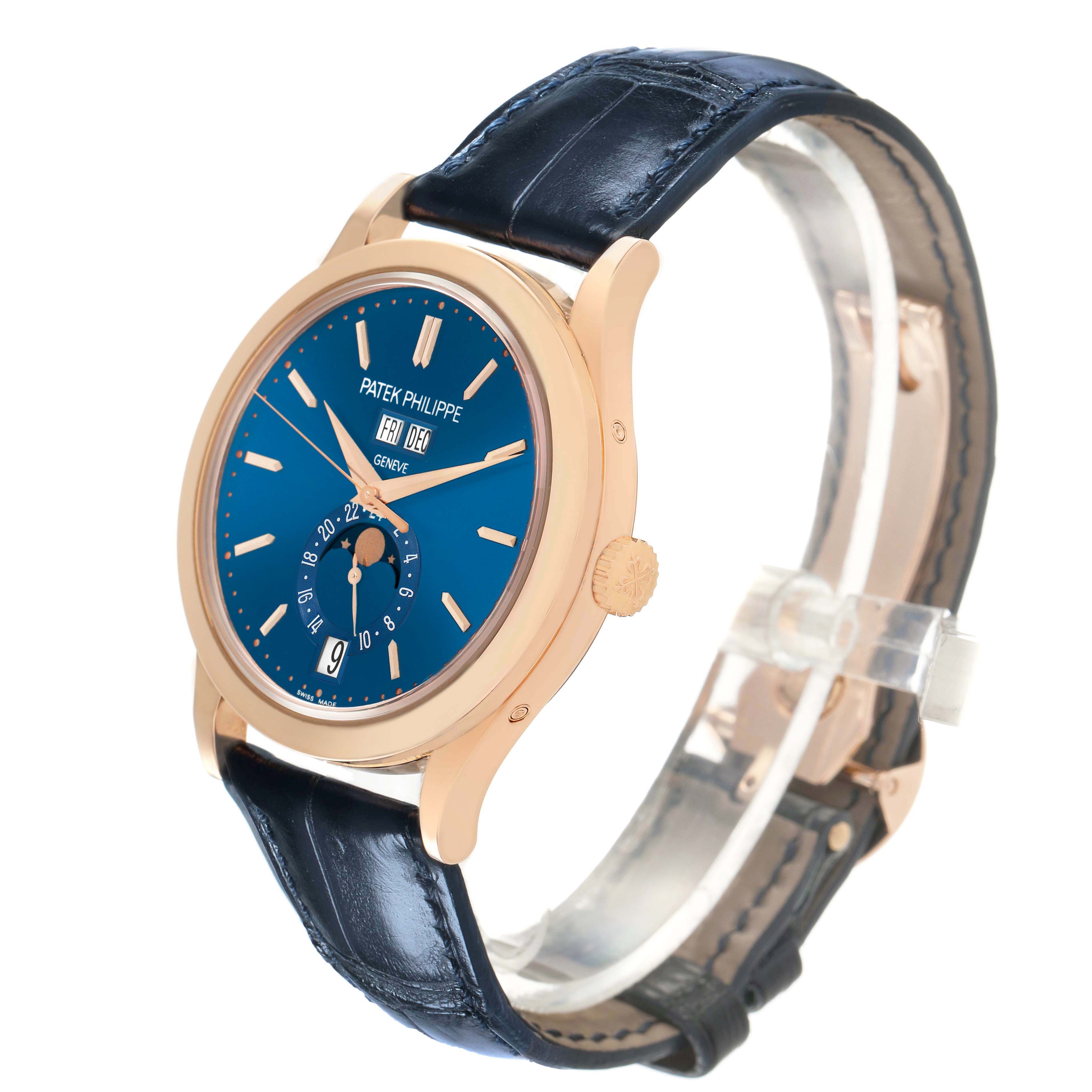 The Patek Philippe Complications 5396R 5396 Mens Rose Gold Blue Dial watch is shown at a slight angle, displaying the blue dial, gold case, and leather strap.