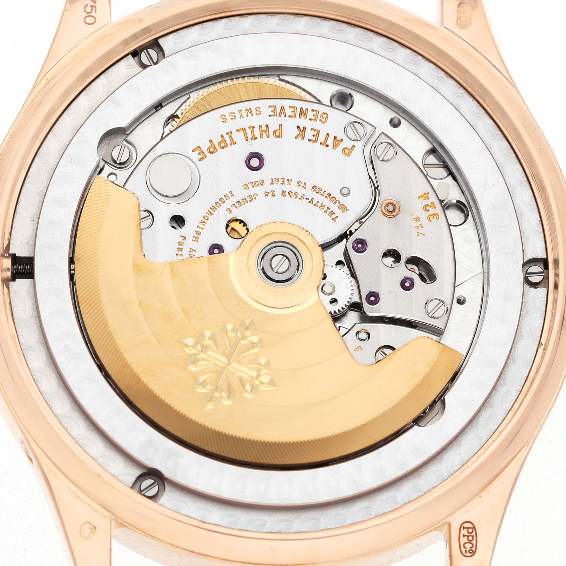 The image shows the back view of a Patek Philippe Complications 5396R 5396 Men's Rose Gold Blue Dial watch, highlighting its intricate movement and rotor.