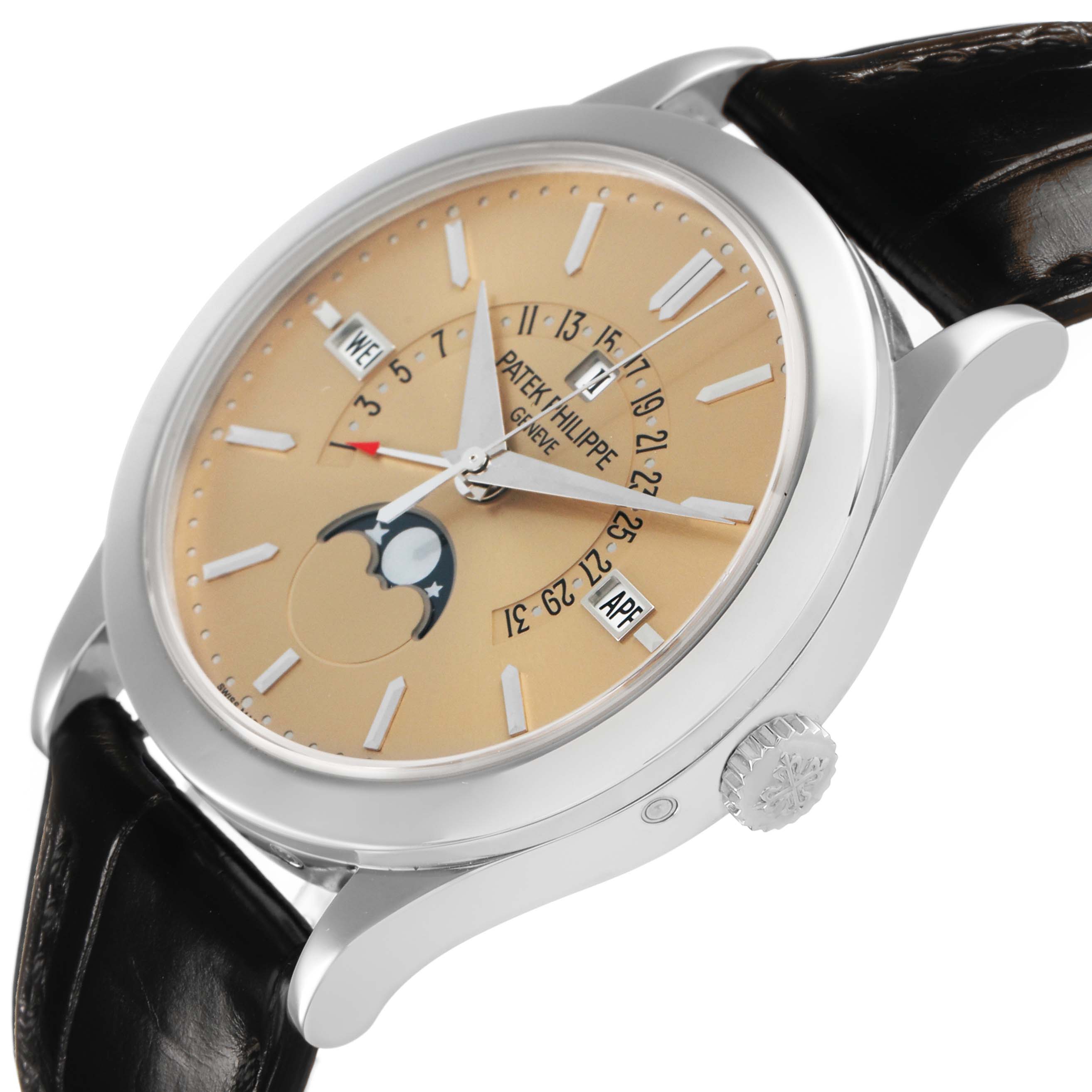 The Patek Philippe Complications 5496P-014 Men's Platinum Brown Dial watch is shown at an angled view, highlighting the dial, moonphase, crown, and lugs.