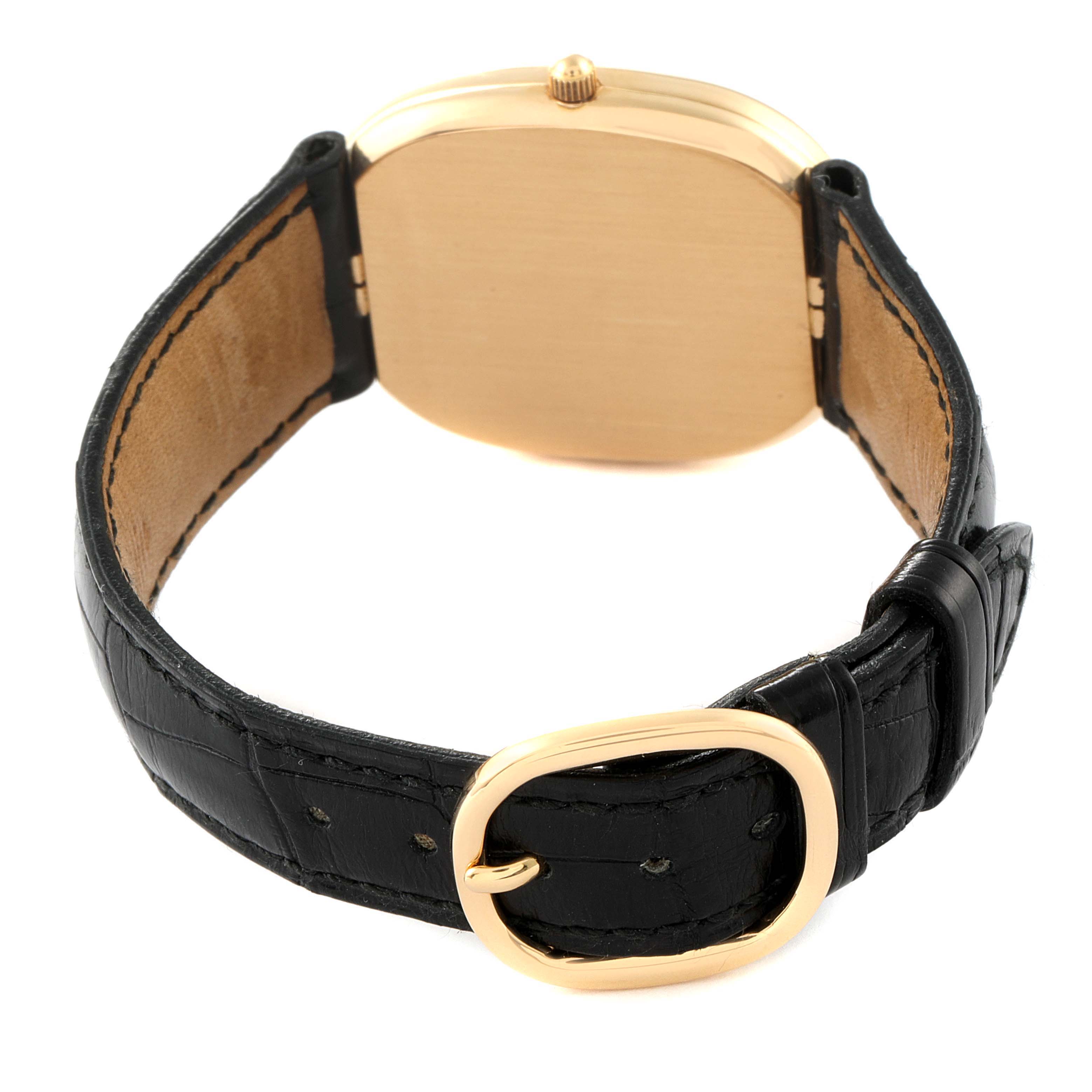 The image shows the back case and black leather strap with buckle of the Patek Philippe Golden Ellipse 3747 Men's Yellow Gold Blue Dial 3747 Men's Yellow Gold Blue Dial watch, photographed from a rear angle.