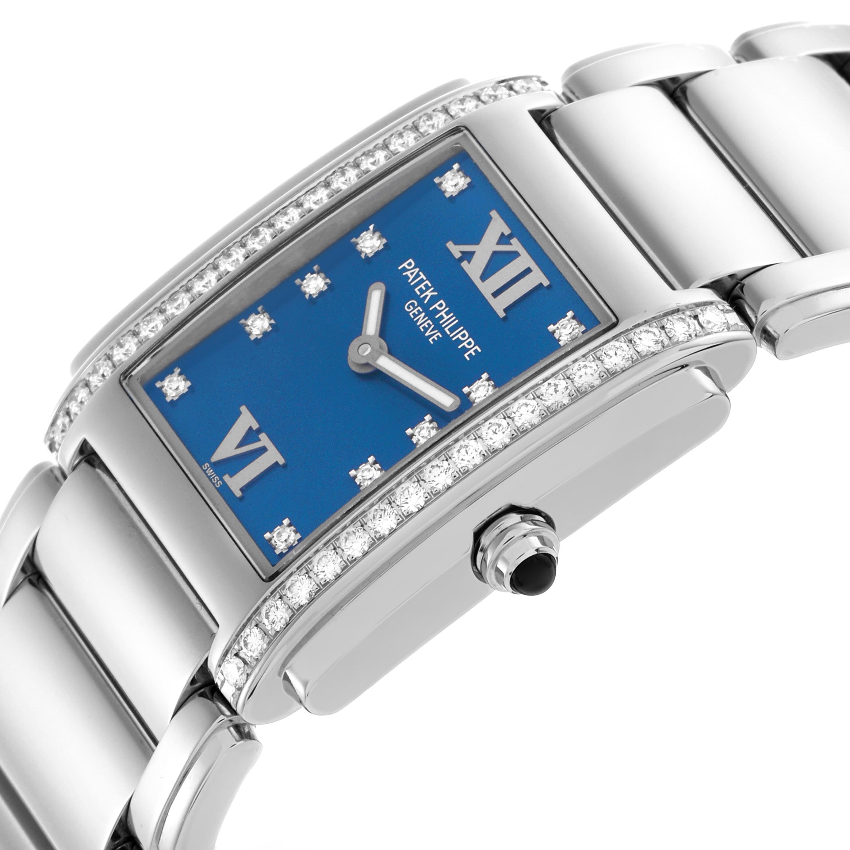 The image shows a side angle of a Patek Philippe Twenty-4 4910/10A Women's Stainless Steel Blue Dial 4910/10A Women's Stainless Steel Blue Dial, highlighting the blue rectangular dial, diamond accents, and bracelet.
