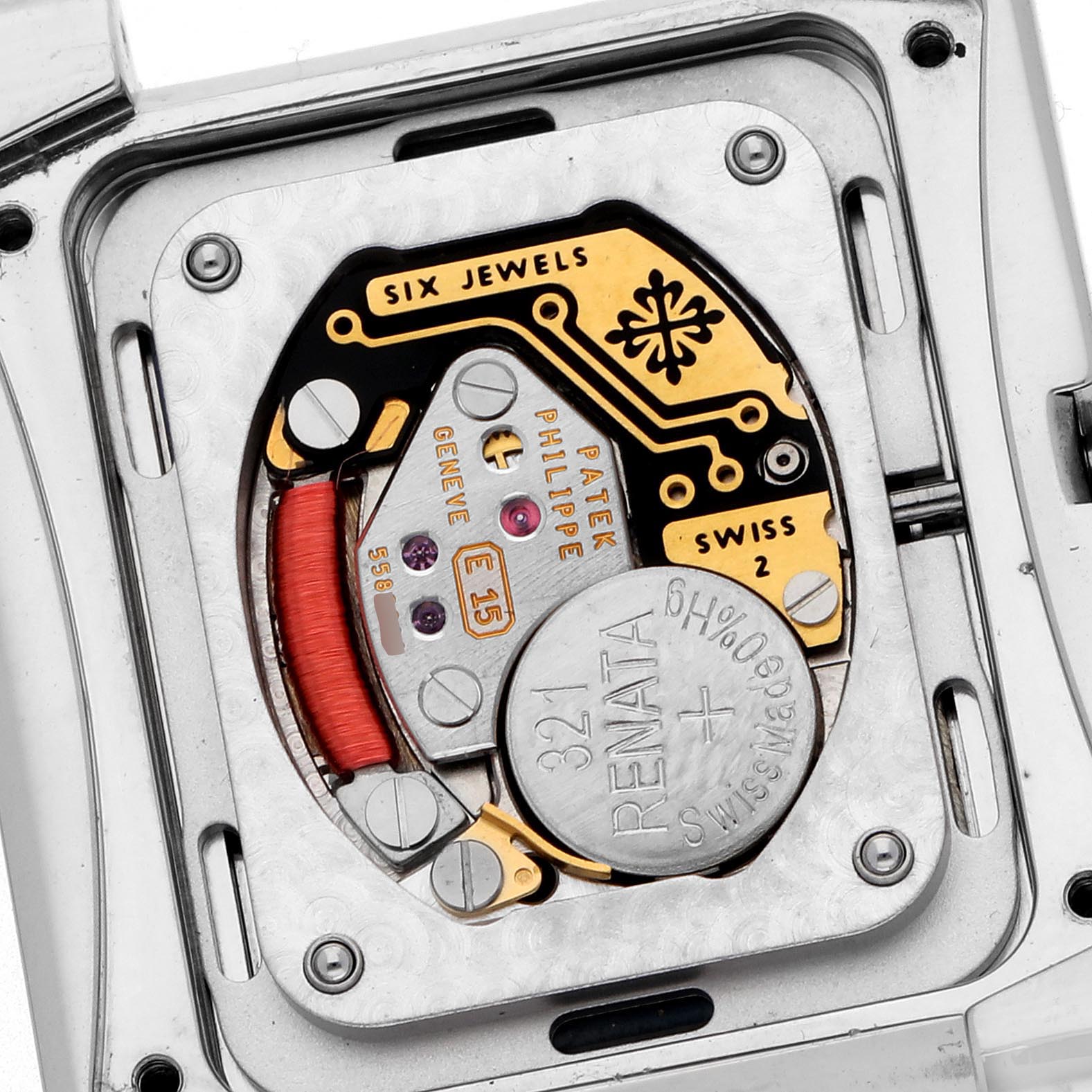 The image shows the intricate movement of a Patek Philippe Twenty-4 4910/10A Women's Stainless Steel Blue Dial 4910/10A Women's Stainless Steel Blue Dial watch from a top-down angle, highlighting its mechanical components.