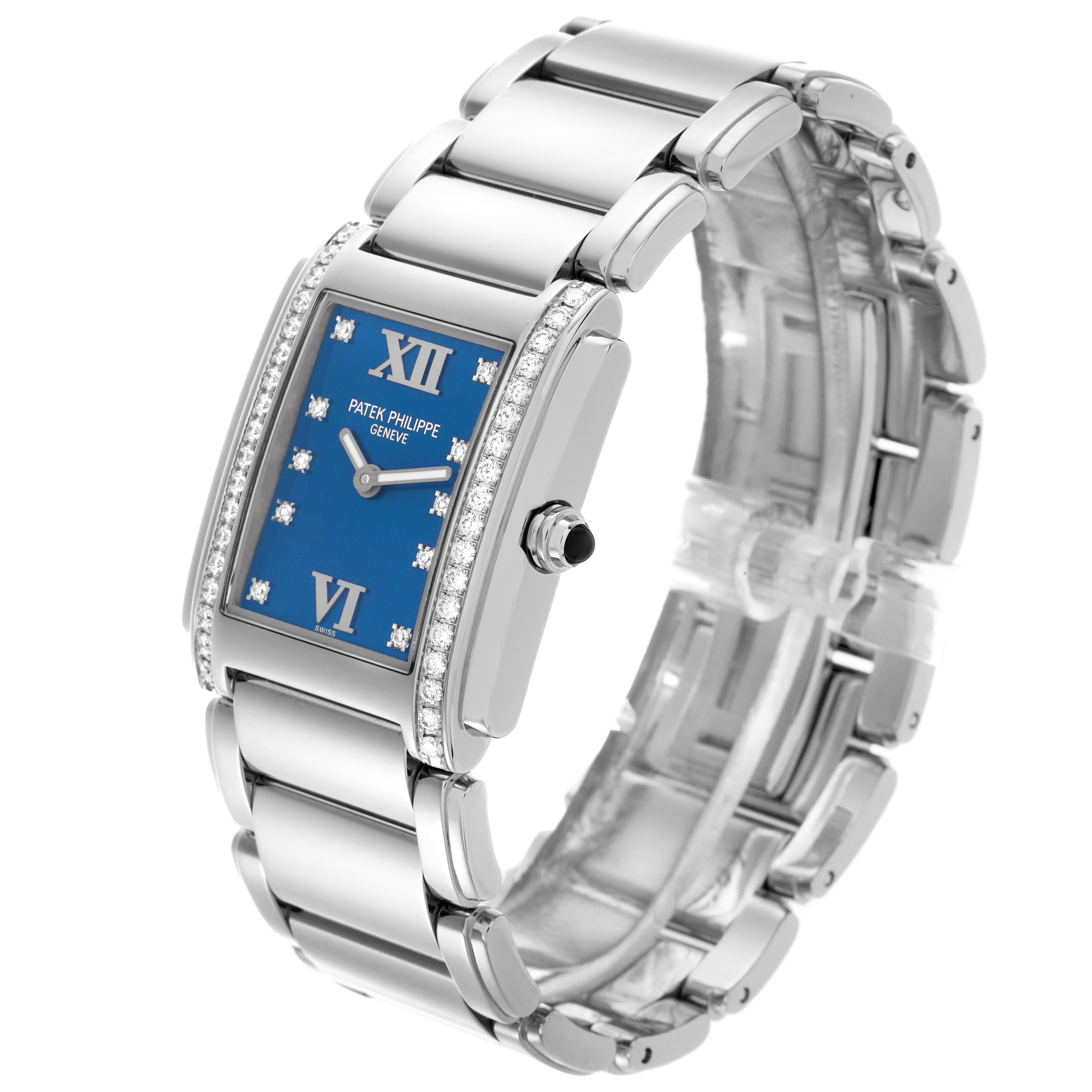 The Patek Philippe Twenty-4 4910/10A Women's Stainless Steel Blue Dial 4910/10A Women's Stainless Steel Blue Dial watch is shown at an angled side view, highlighting its blue dial and diamond-set bezel.