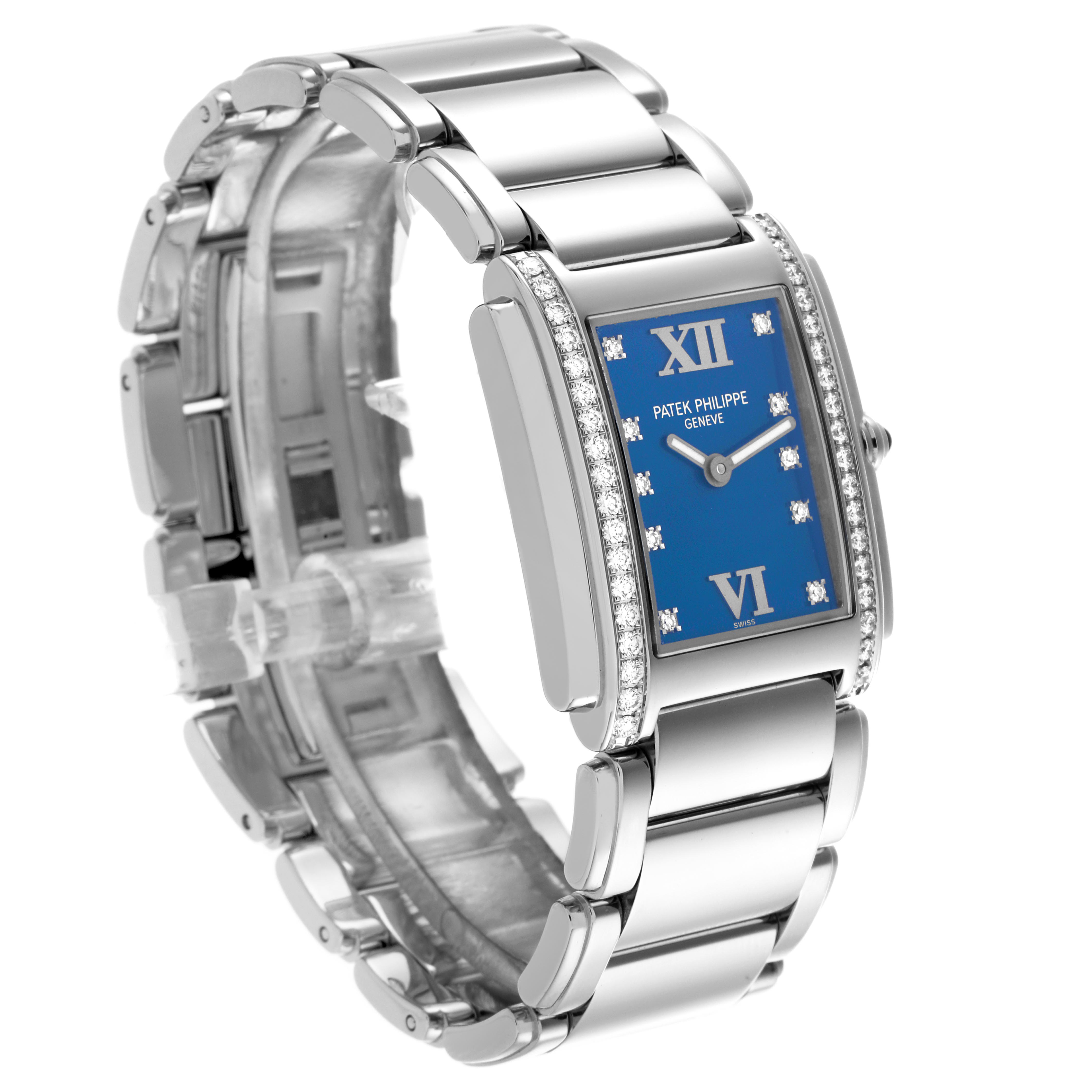 The Patek Philippe Twenty-4 4910/10A Women's Stainless Steel Blue Dial 4910/10A Women's Stainless Steel Blue Dial watch is shown at a three-quarter angle, displaying its bracelet and the blue, diamond-accented dial.