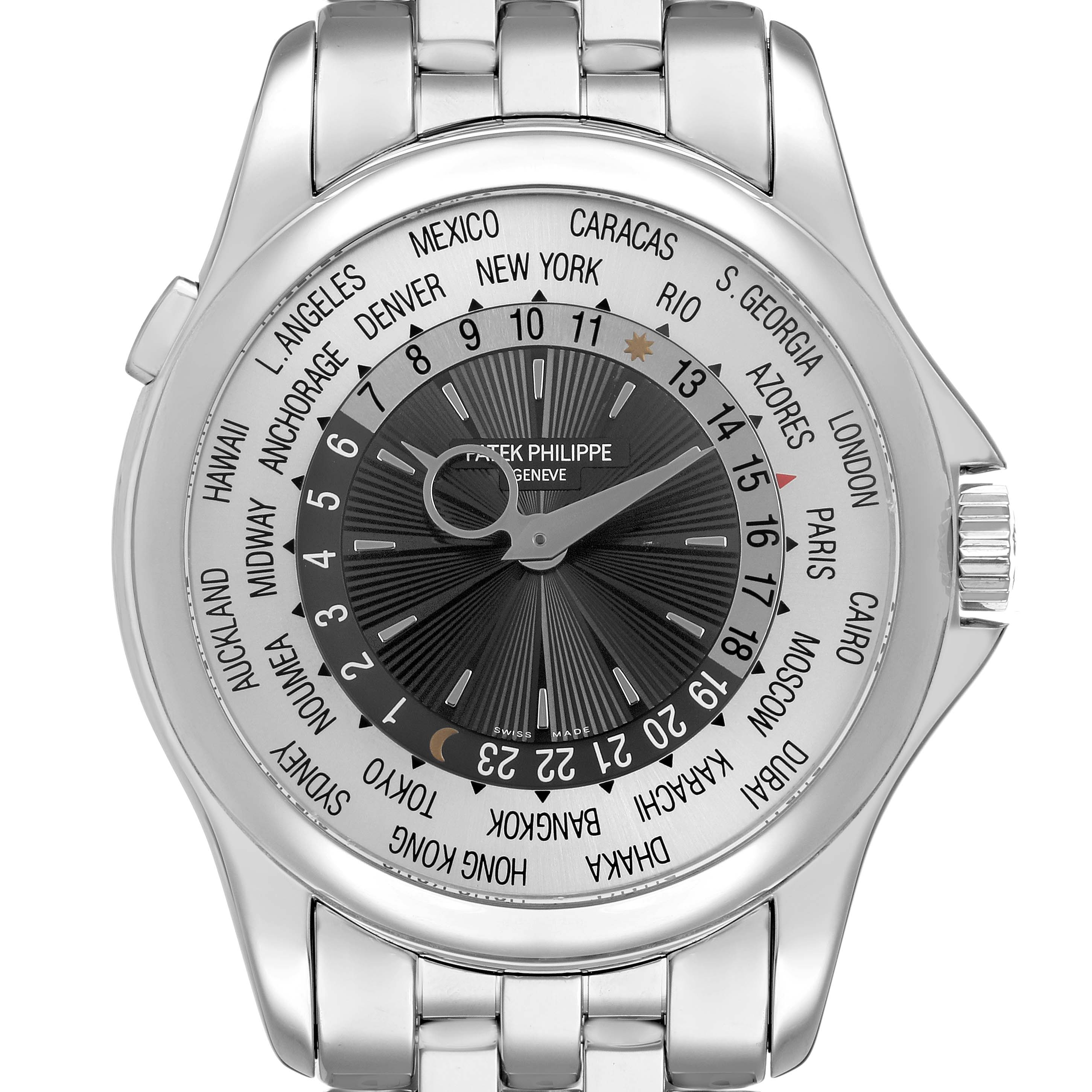 The Patek Philippe Complications 5130/1G-010 Men's White Gold Black Dial model is shown from a top-down angle, highlighting the dial and bracelet.