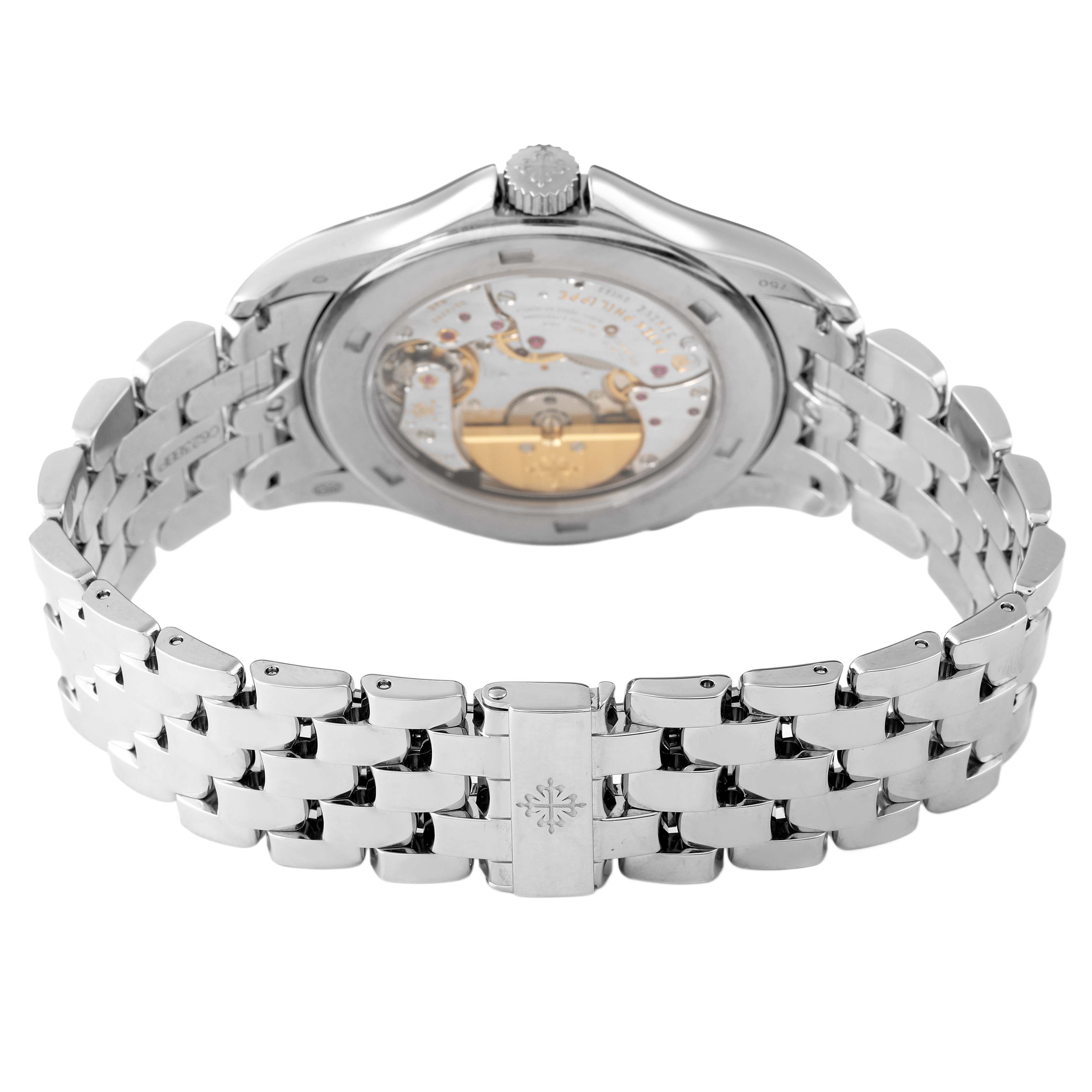 The image shows the back view of a Patek Philippe Complications 5130/1G-010 Men's White Gold Black Dial watch, highlighting its movement and the stainless steel bracelet.