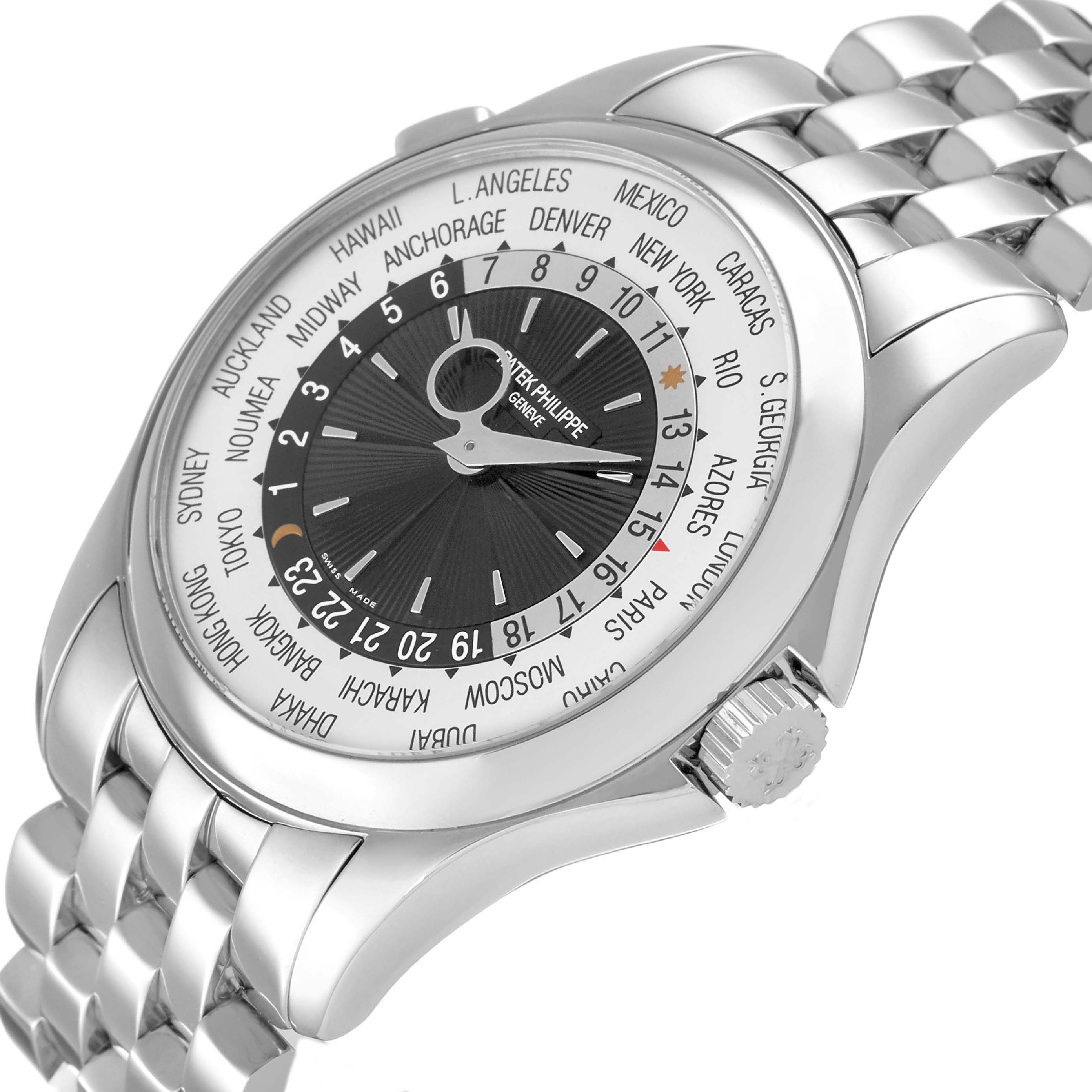 The Patek Philippe Complications 5130/1G-010 Mens White Gold Black Dial watch is shown from a top-side angle, displaying its dial, bezel, crown, and part of the bracelet.