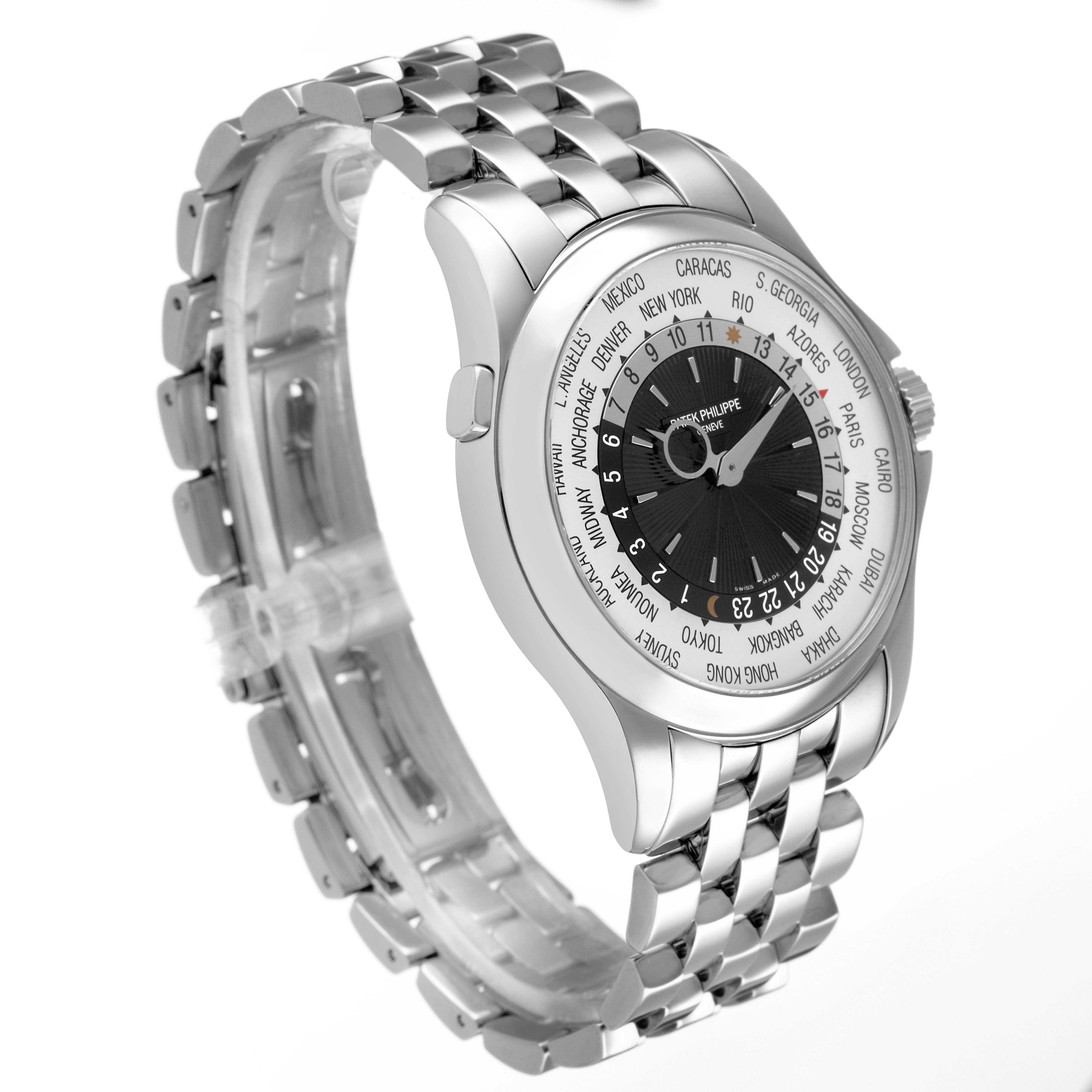 The Patek Philippe Complications 5130/1G-010 Men's White Gold Black Dial watch is shown at a slight angle, displaying its face, bezel, and metal bracelet.