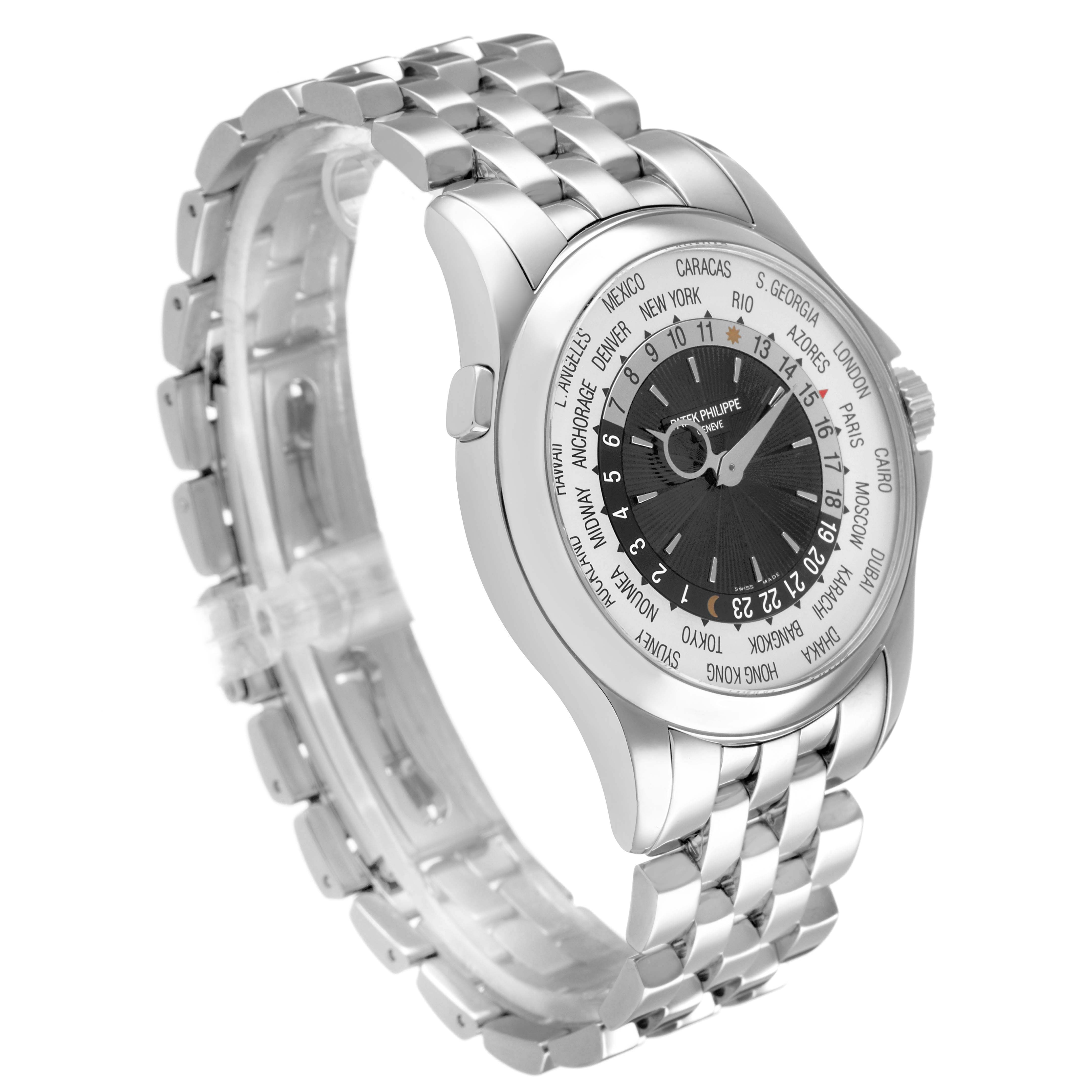 The Patek Philippe Complications 5130/1G-010 Mens White Gold Black Dial watch is shown at a three-quarter angle, highlighting the dial and metal bracelet.