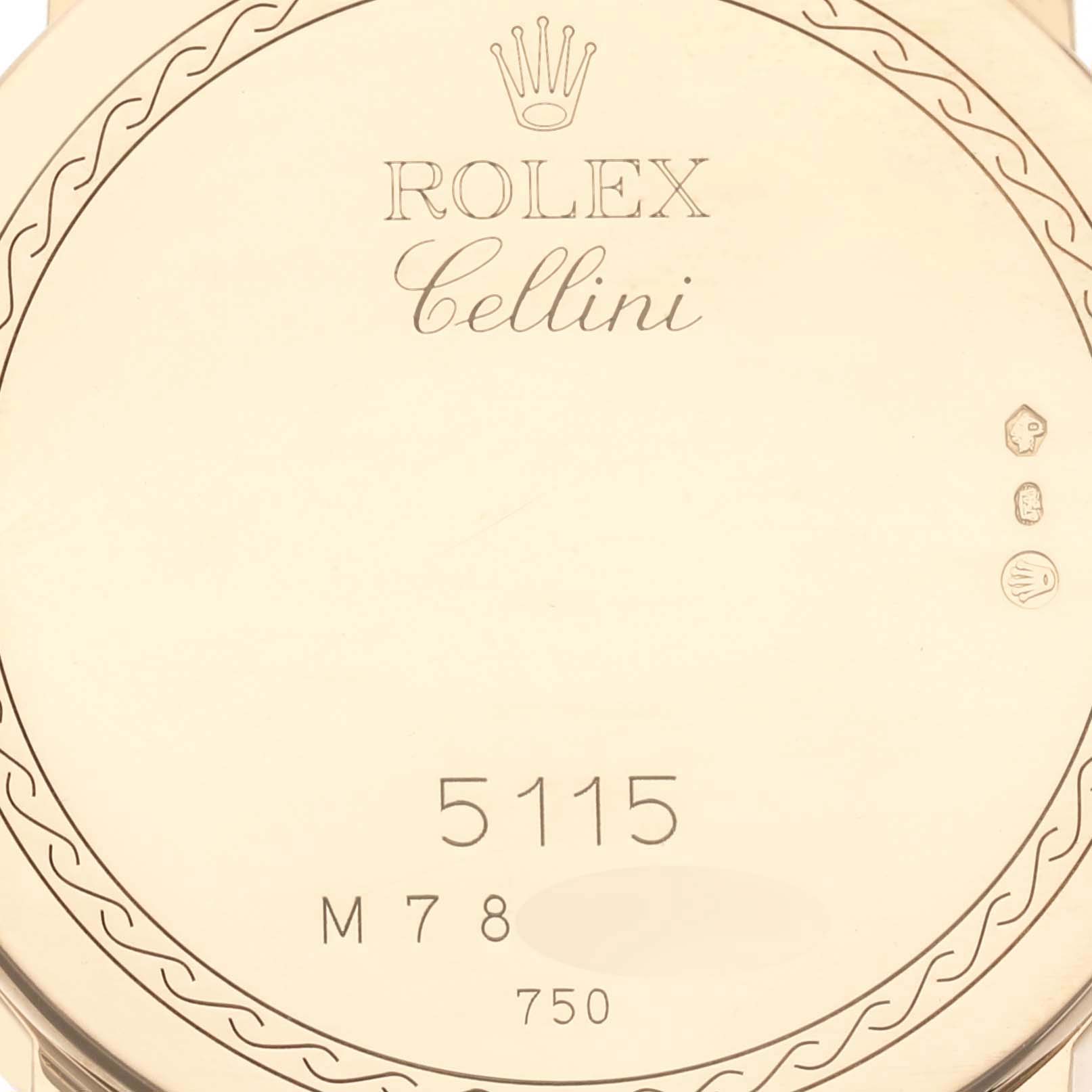 The image shows the back of a Rolex Cellini 5115 Men's Yellow Gold Beige Dial 5115 Men's Yellow Gold Beige Dial watch engraved with the model number and hallmark details.