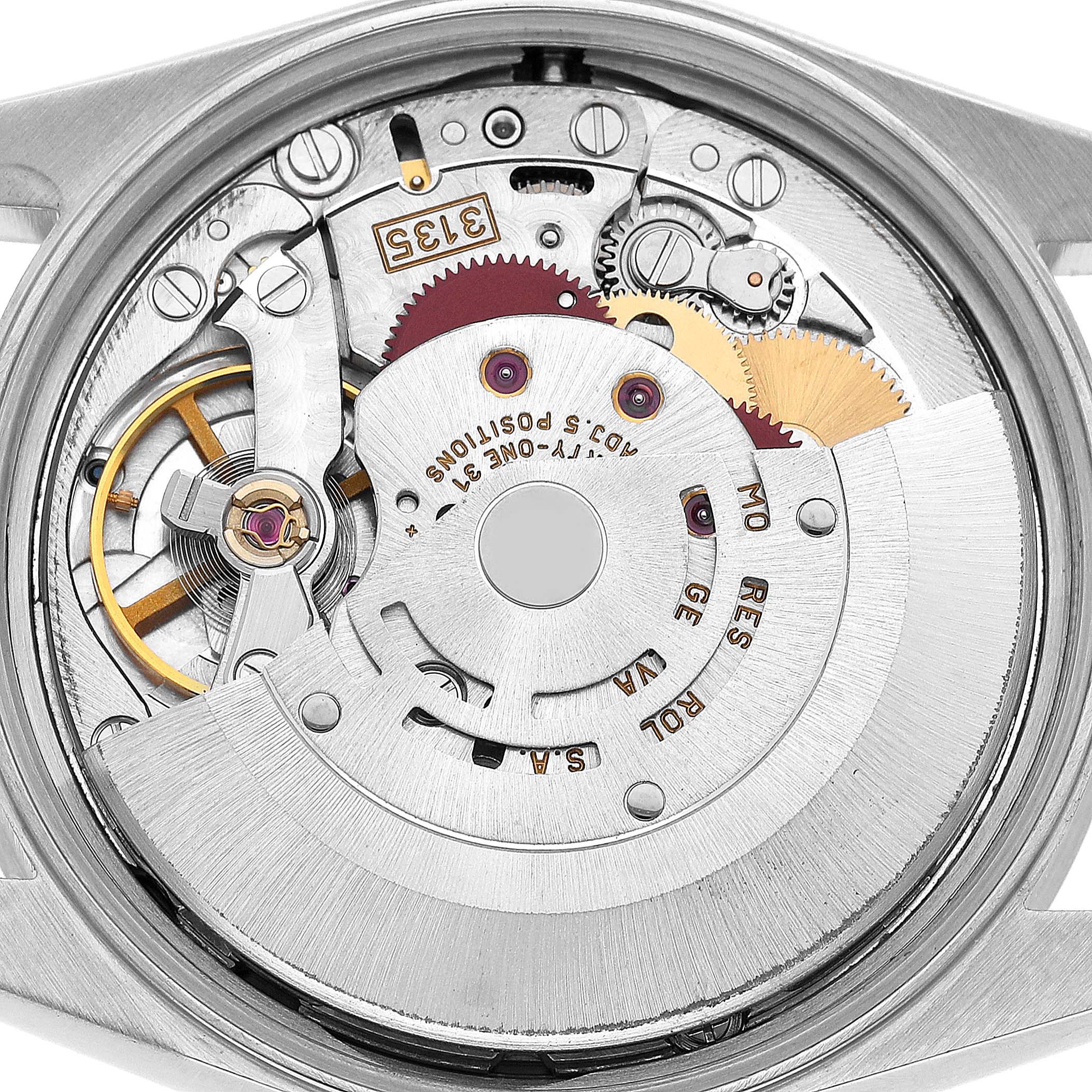 The image shows the open case back of a Rolex Date 15210 Men's Stainless Steel White Dial model, displaying its mechanical movement and components.