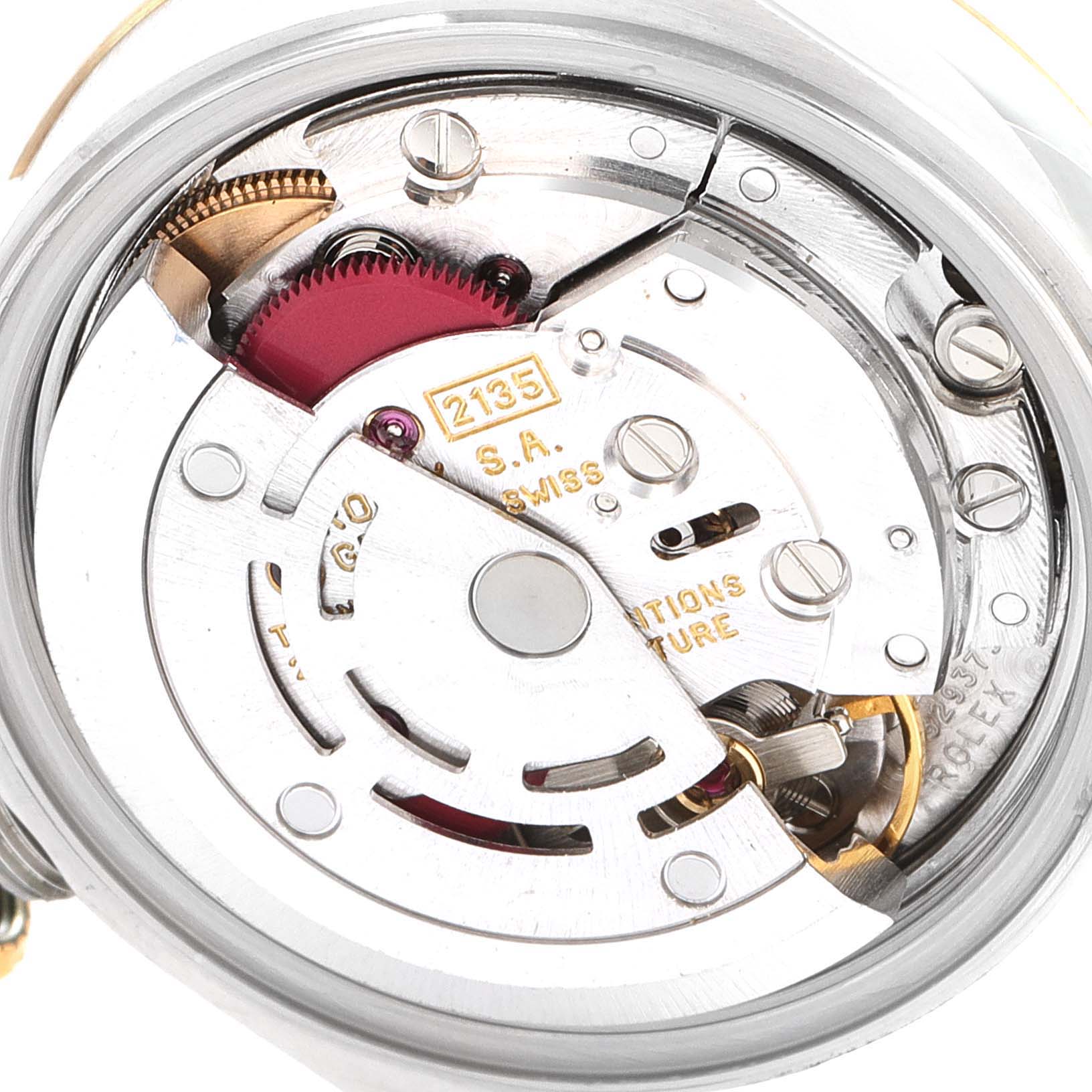 This image shows the internal mechanism of a Rolex Datejust 69173 Women
s Steel and Gold (two tone) Champagne Dial 69173 Women
s Steel and Gold (two tone) Champagne Dial watch, captured from the back, displaying its intricate movement components.