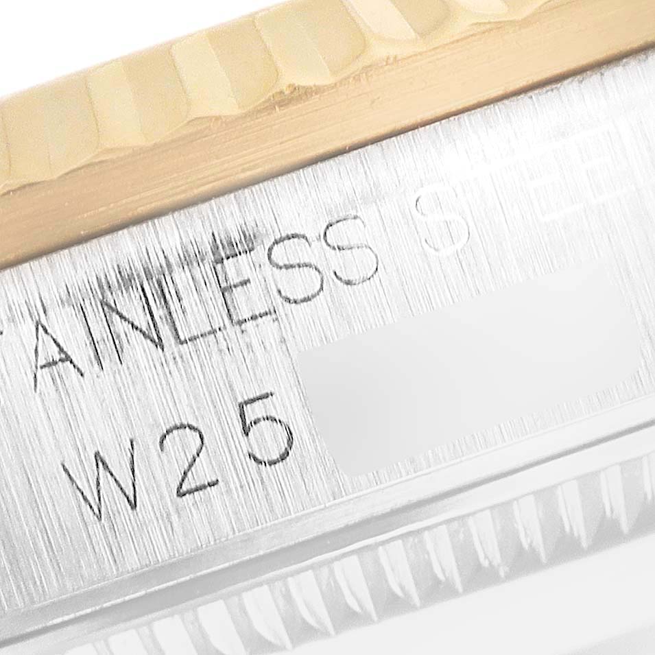 This image shows a close-up of the stainless steel case and engraved text of a Rolex Mid-Size 68273 Women
s Steel and Gold (two tone) White Dial 68273 Women
s Steel and Gold (two tone) White Dial model watch.