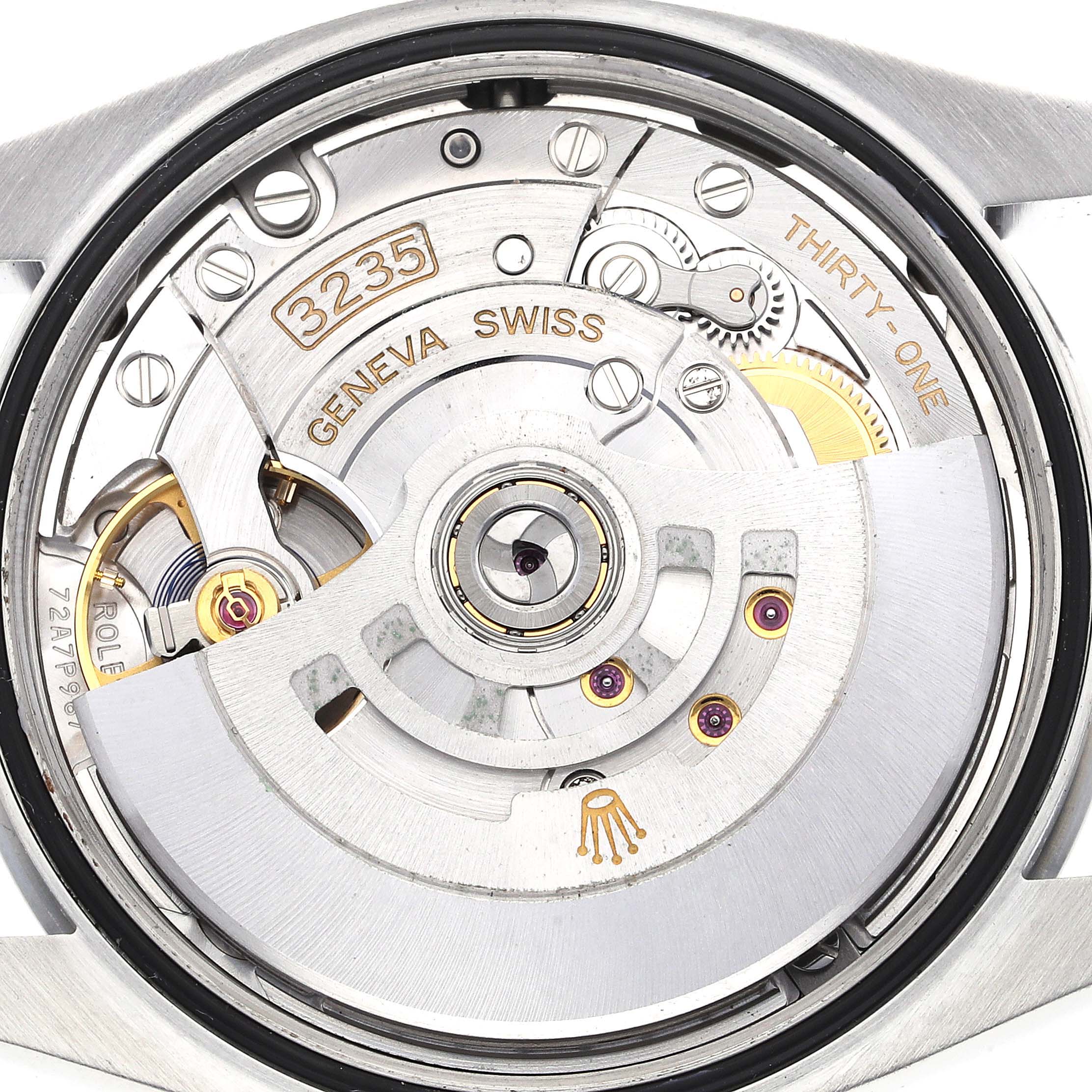 This image shows the back view of the Rolex Datejust 126200 Men's Stainless Steel Blue Dial 126200 Men's Stainless Steel Blue Dial watch, focusing on its intricate movement mechanism.