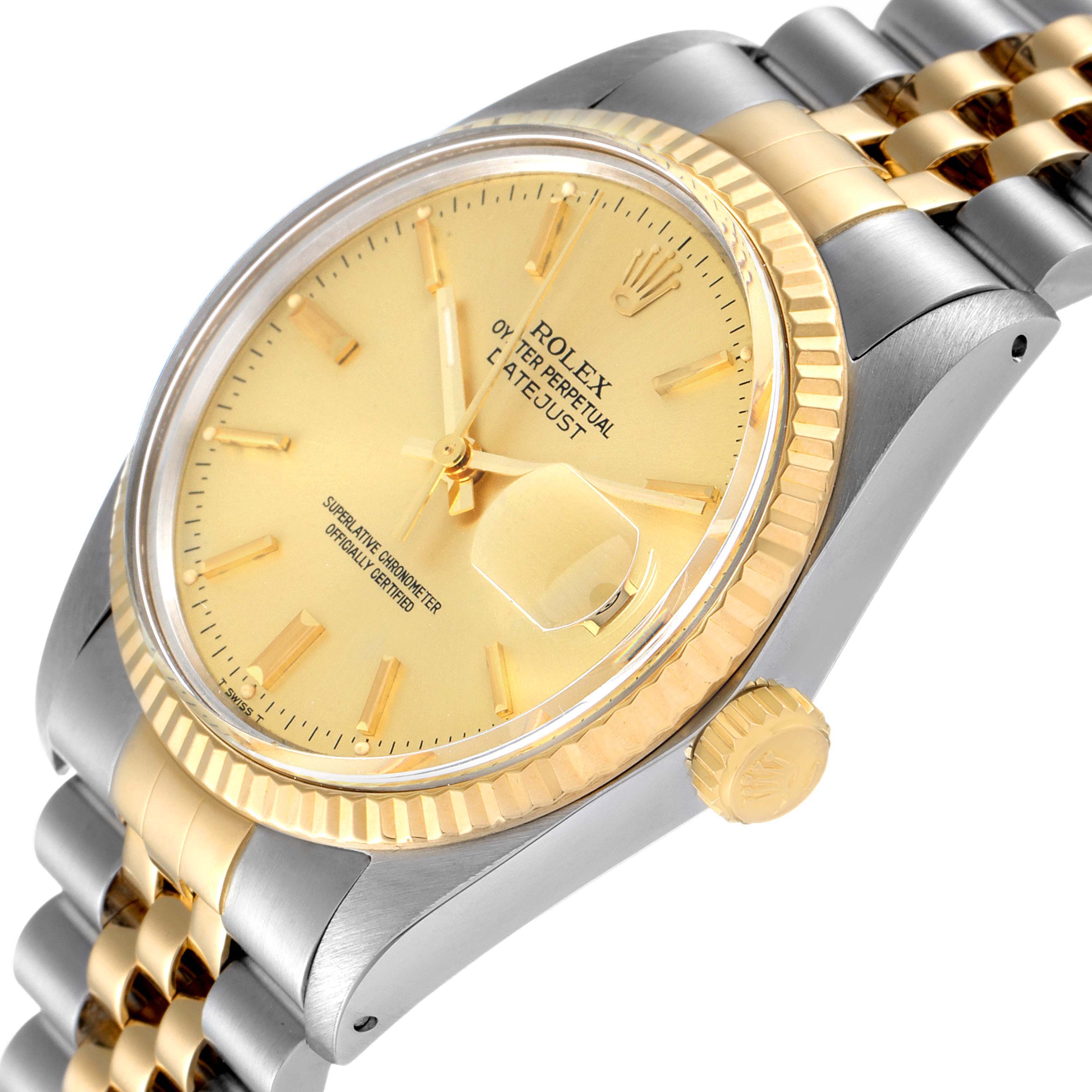 This image shows the Rolex Datejust 16013 Men's Steel and Gold (two tone) Champagne Dial 16013 Men's Steel and Gold (two tone) Champagne Dial watch at an angled view, highlighting the face, bezel, and part of the bracelet.