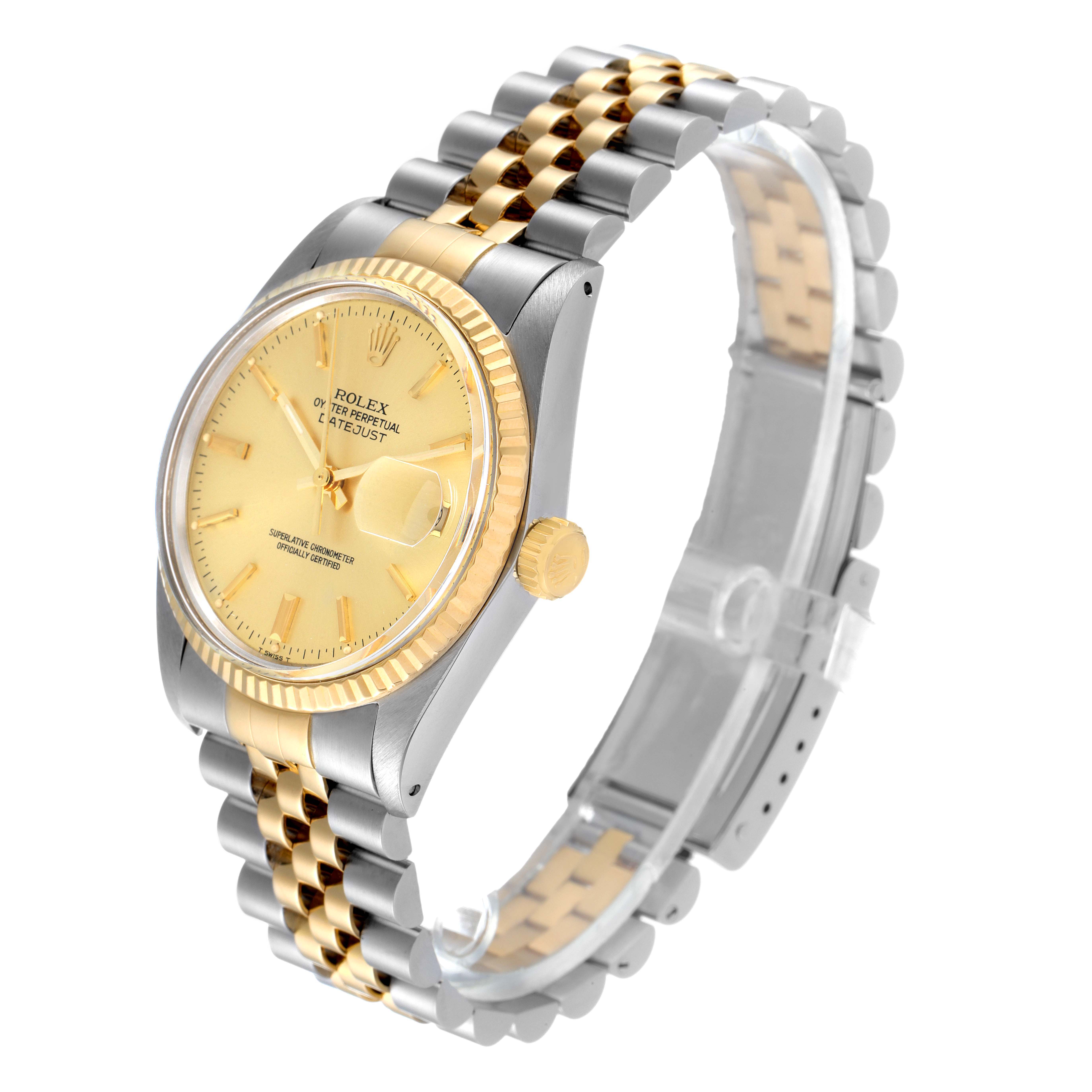 This image shows a side angle of the Rolex Datejust 16013 Men's Steel and Gold (two tone) Champagne Dial 16013 Men's Steel and Gold (two tone) Champagne Dial watch, highlighting the gold and silver tones, dial, bracelet, and fluted bezel.