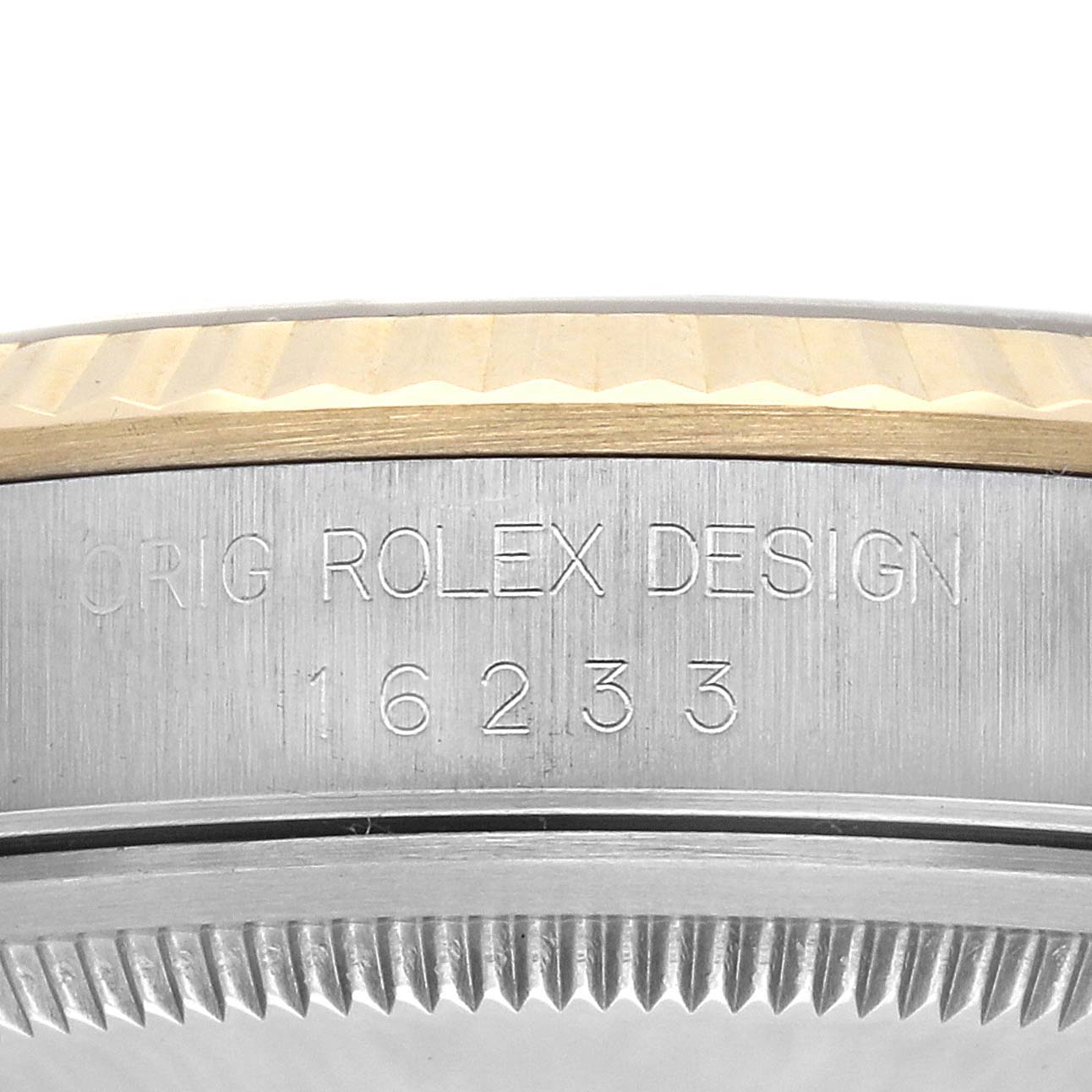 The image shows the side and casing of a Rolex Datejust 16233 Men
s Steel and Gold (two tone) Champagne Dial 16233 Men
s Steel and Gold (two tone) Champagne Dial, displaying the model number and Rolex branding.