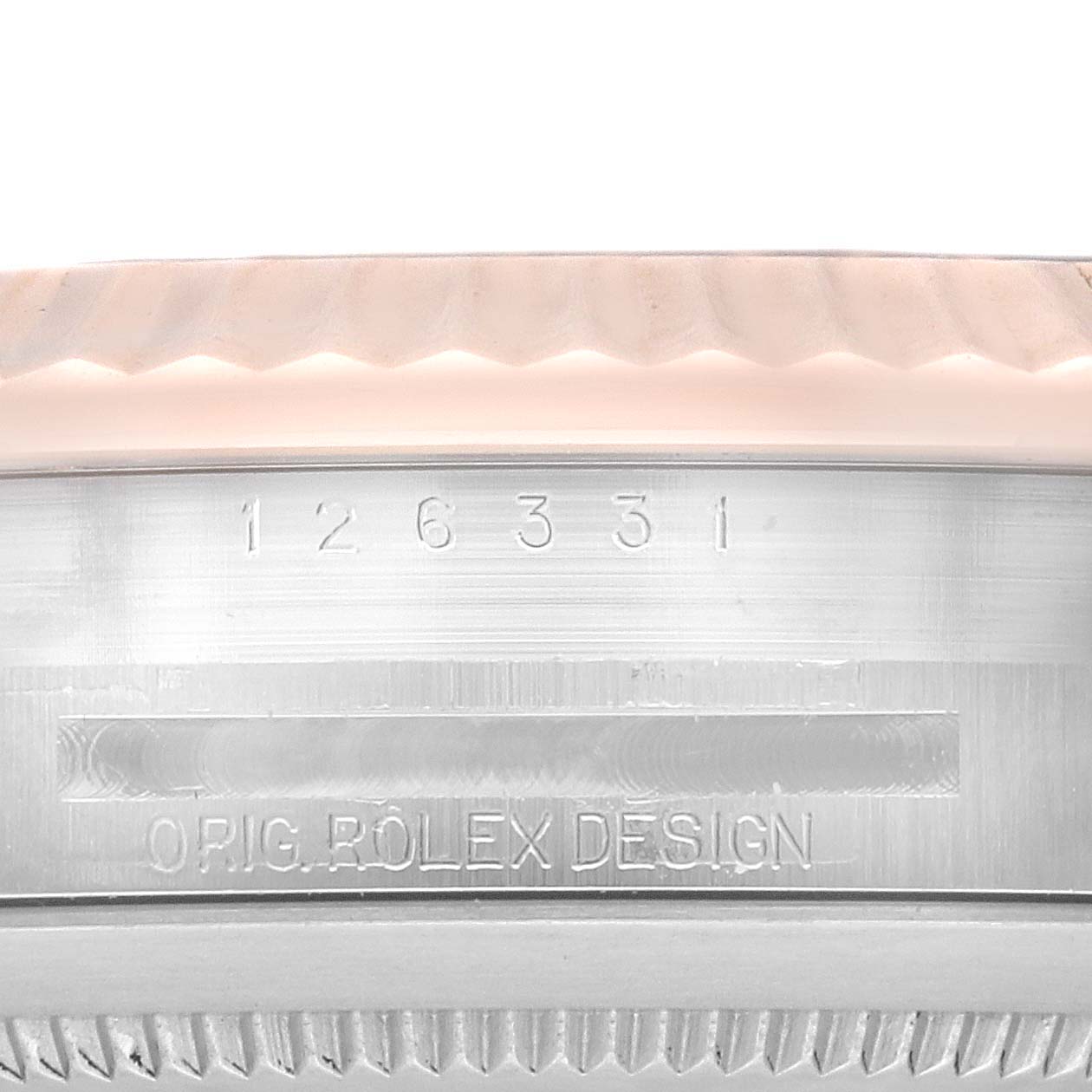 The image shows the side of a Rolex Datejust 41 126331 Men's Steel and Gold (two tone) Brown Dial 126331 Men's Steel and Gold (two tone) Brown Dial watch, highlighting the serial number and "ORIG. ROLEX DESIGN" engraving.