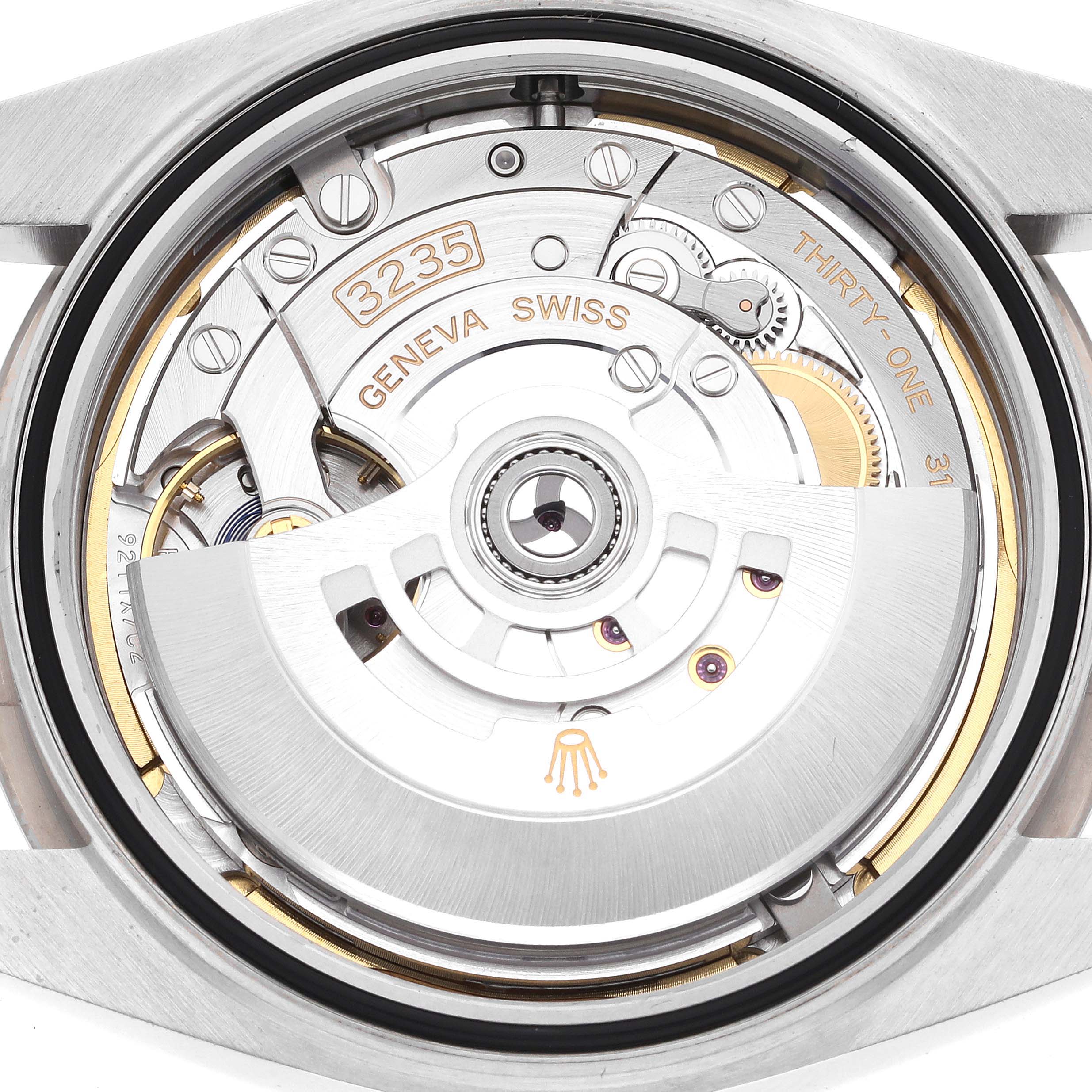 The image shows the back view of the Rolex Datejust 41 126334 Men
s Stainless Steel Blue Dial 126334 Men
s Stainless Steel Blue Dial, displaying its 3235 automatic movement mechanism.