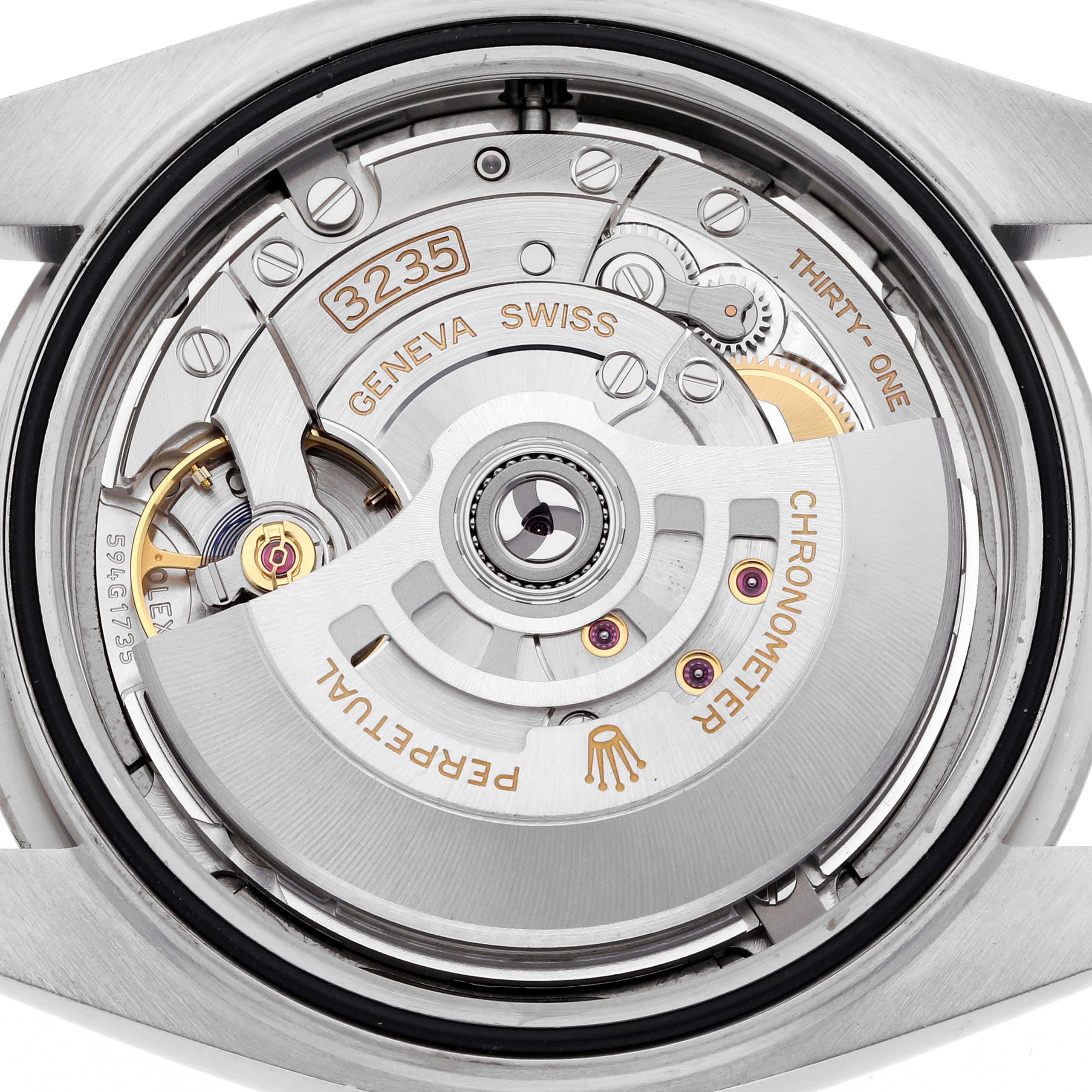 The image shows the movement and internal mechanics of a Rolex Datejust 41 126334 Men's Stainless Steel Grey Dial 126334 Men's Stainless Steel Grey Dial model from the back side.