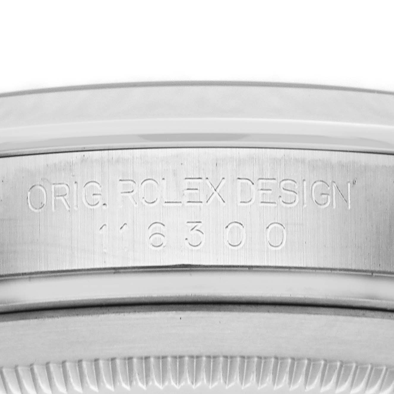 The image shows a close-up of the side of a Rolex Datejust 41 116300 Men's Stainless Steel Black Dial 116300 Men's Stainless Steel Black Dial, featuring the engraved "ORIG. ROLEX DESIGN" and a model number.